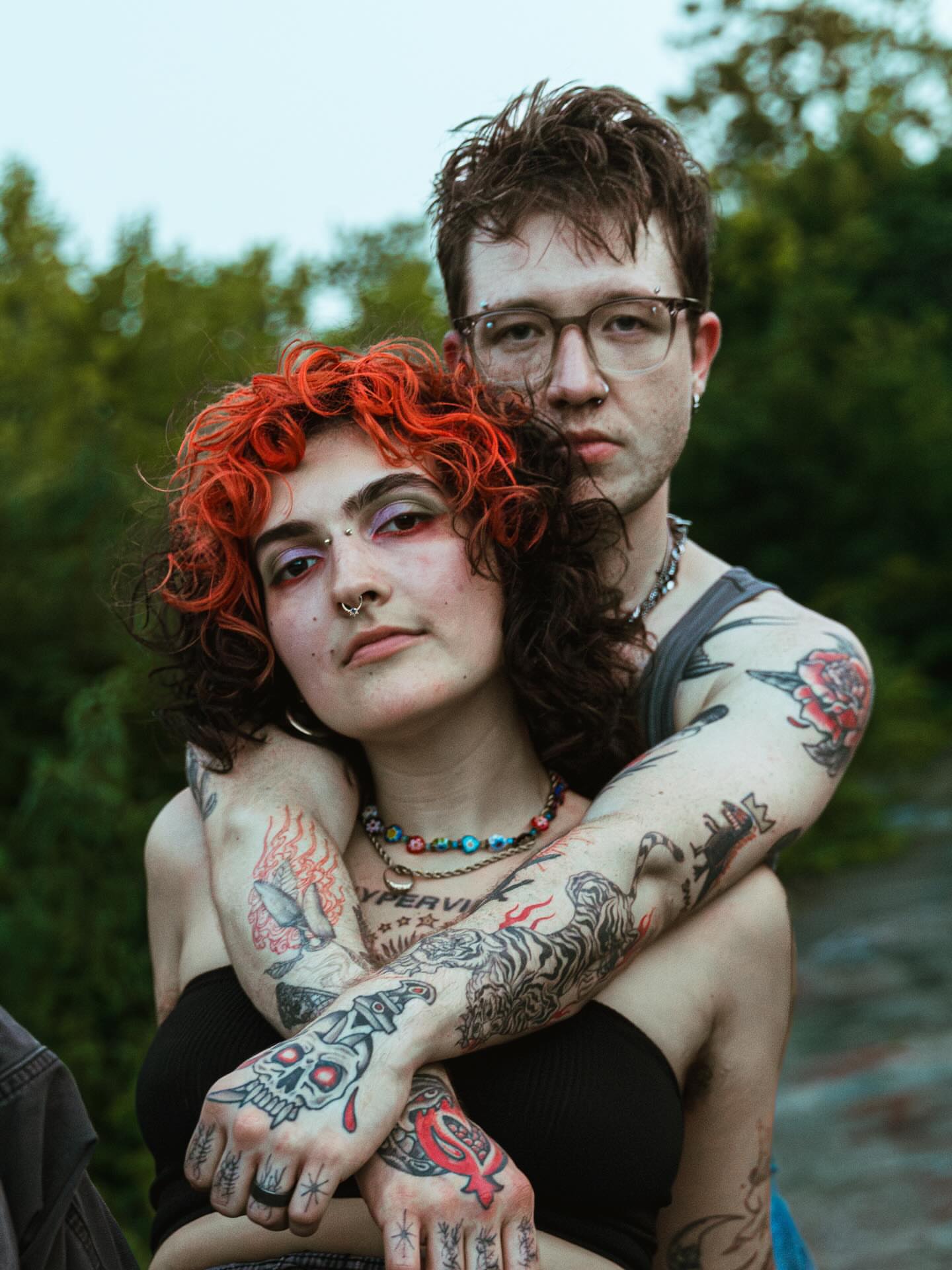 Tattooed couple American traditional tattoo on the torso by kane