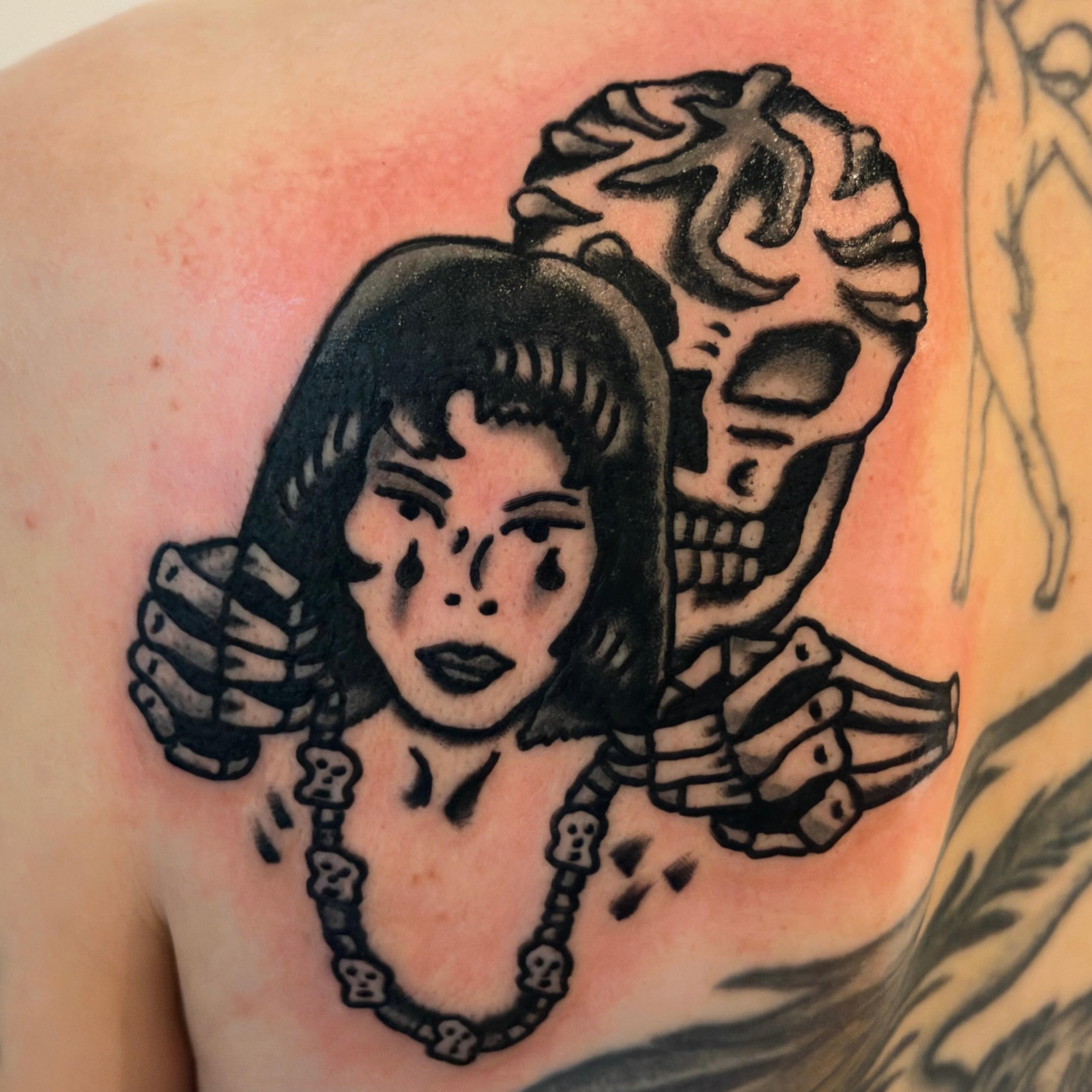 Woman and skull American traditional tattoo on the shoulder by Jake