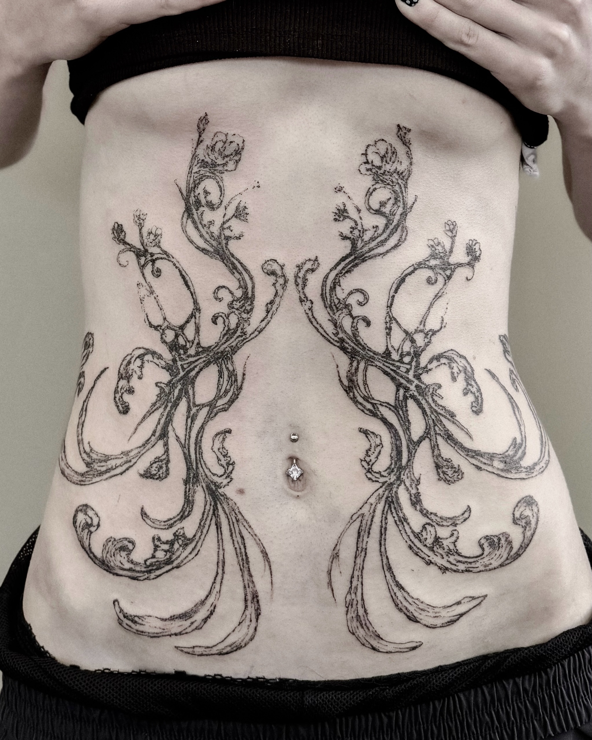 Floral vines black and grey tattoo on the torso by ąʑཞąıą ཞąıŋ