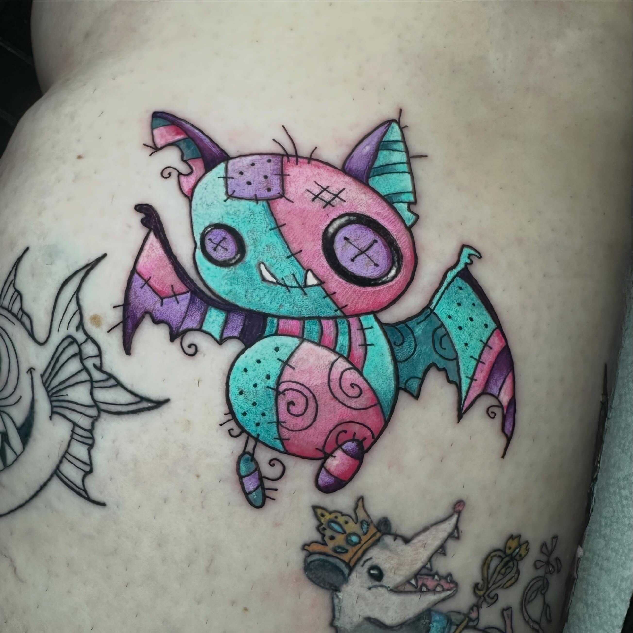 Bat trash polka tattoo on the thigh by Sam, Mount Laurel, New Jersey