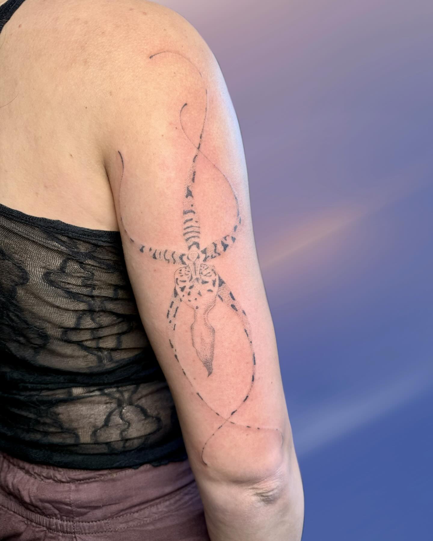Mosquito black and grey tattoo on the upper arm by GG ๐ธ