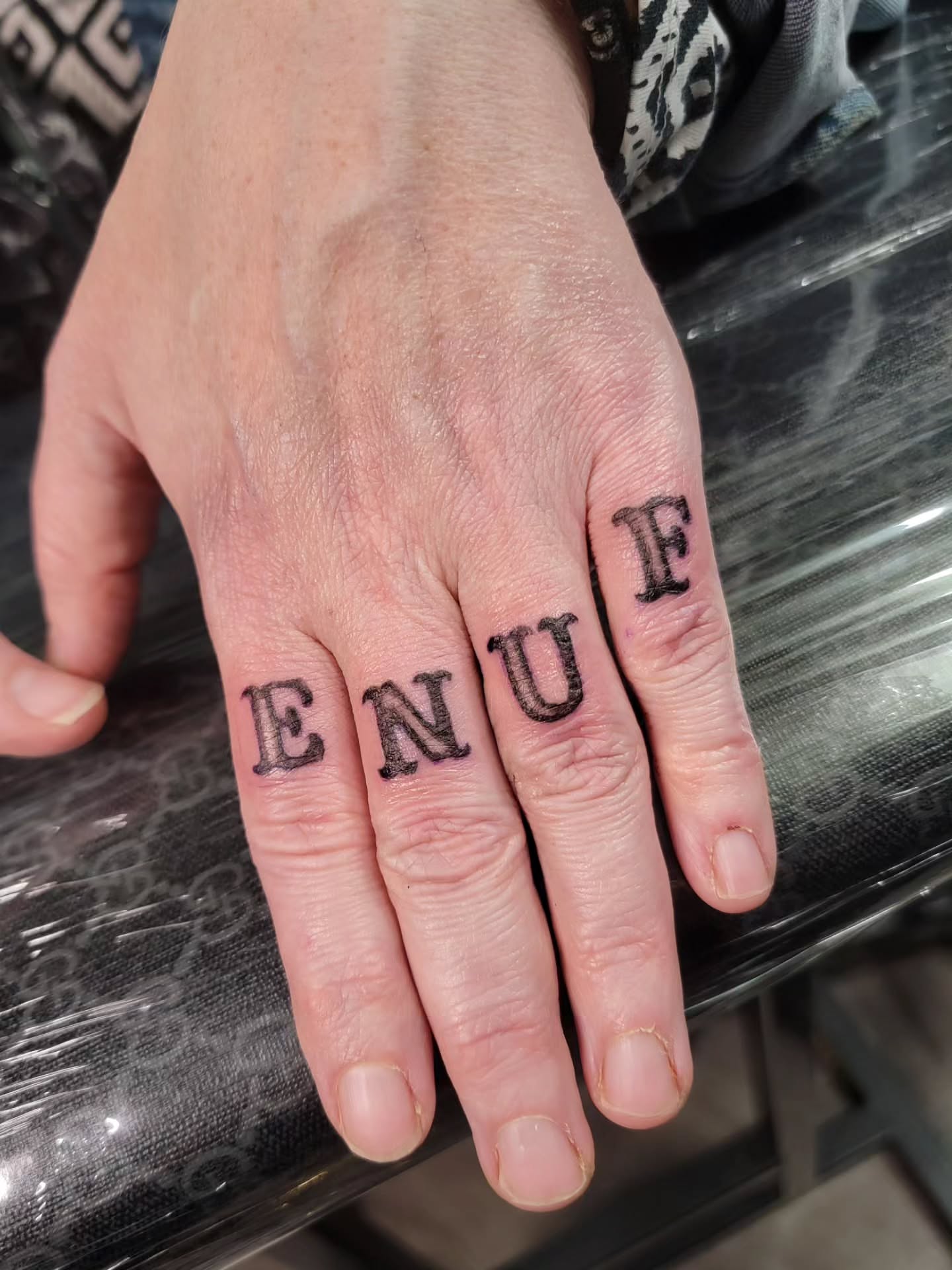 Lettering lettering script tattoo on the hand by Nathan Harkins-Oberbeck