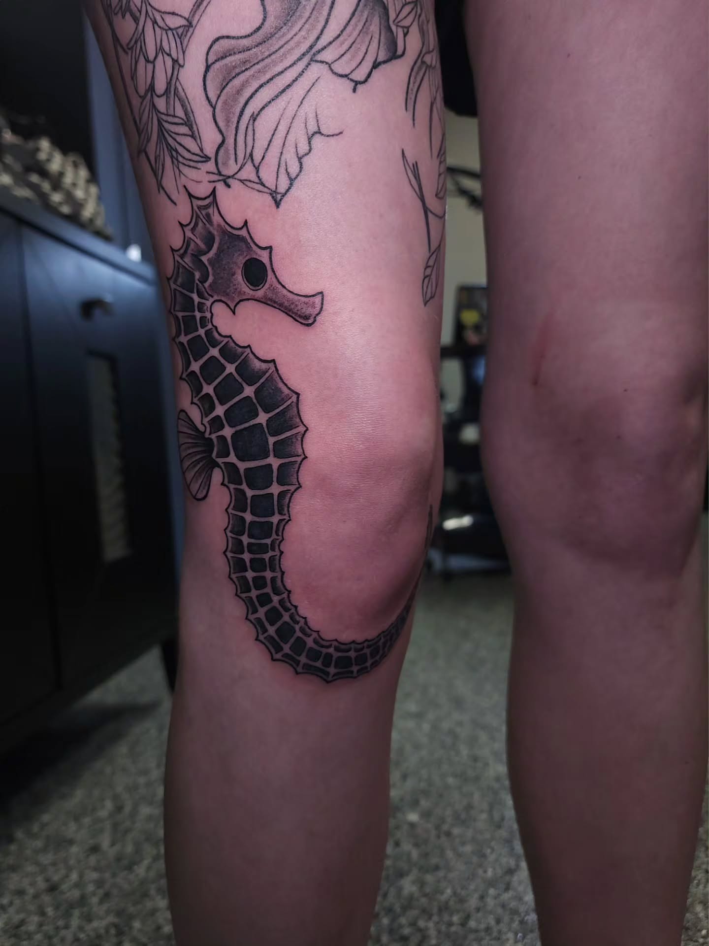 Seahorse black and grey tattoo on the thigh by xavia