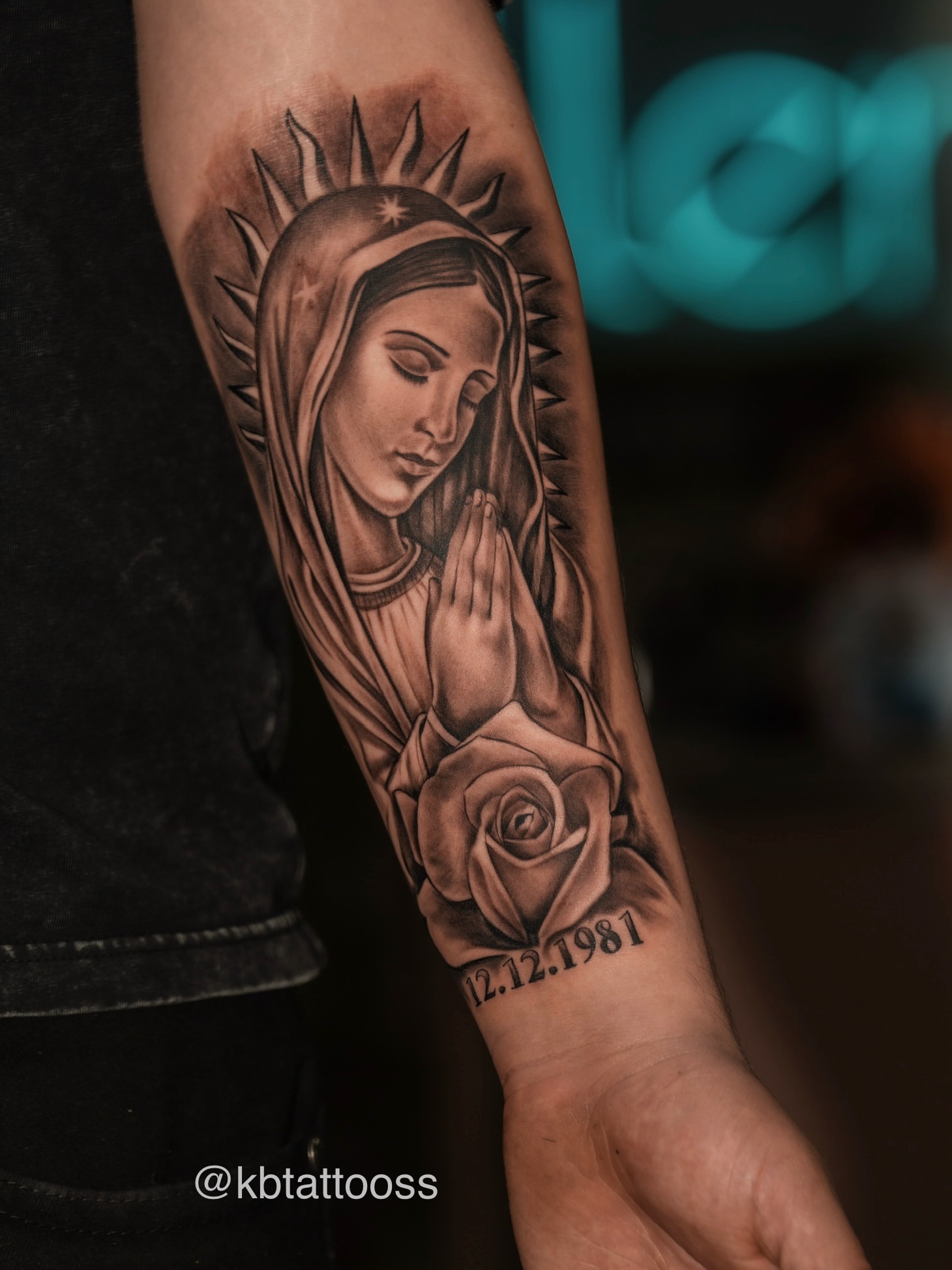 Praying virgin mary black and grey tattoo on the forearm by Kevin Betancourt