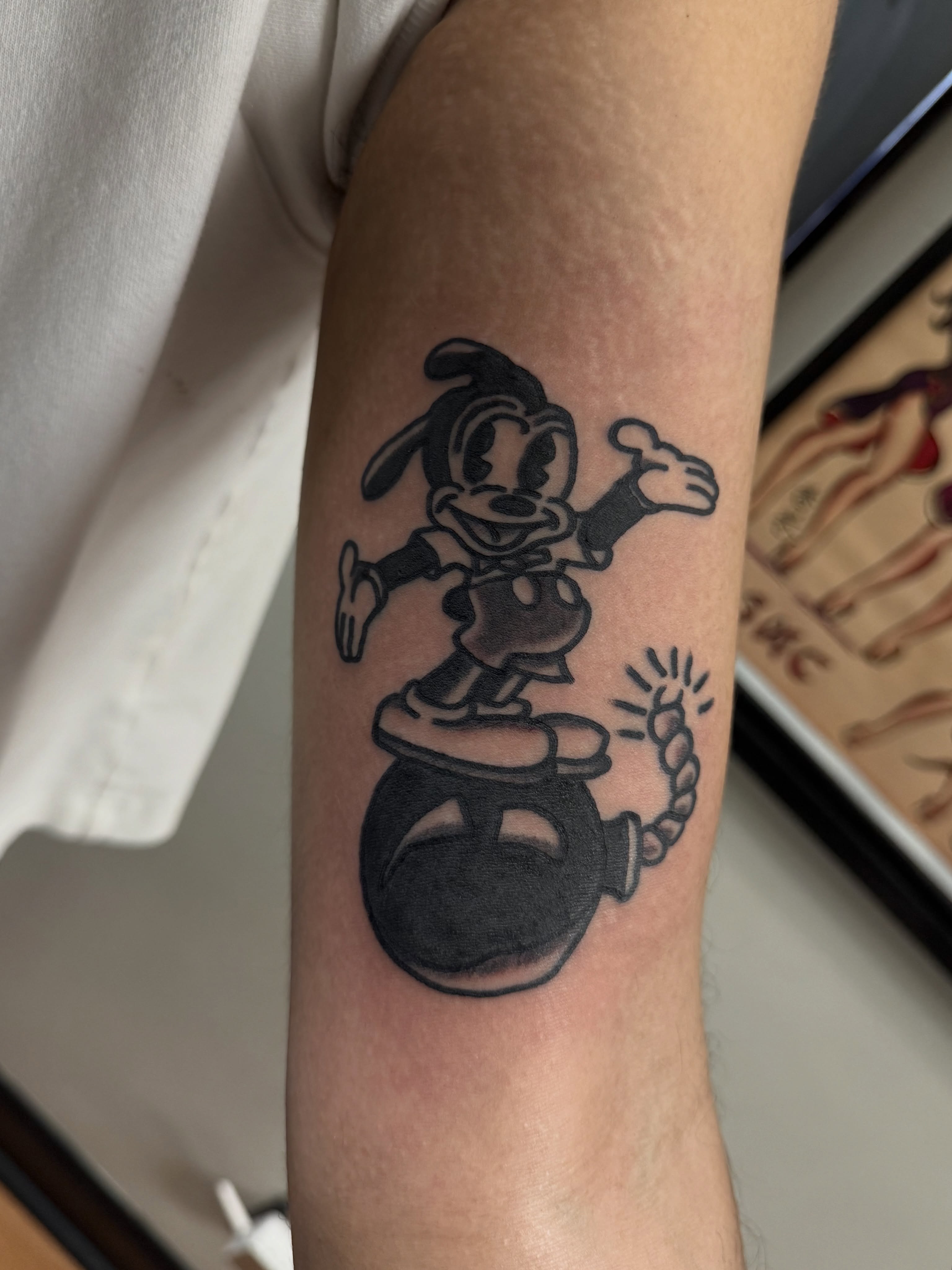 Goofy on top hat black and grey tattoo on the forearm by @kevingaretz, Jersey City, New Jersey