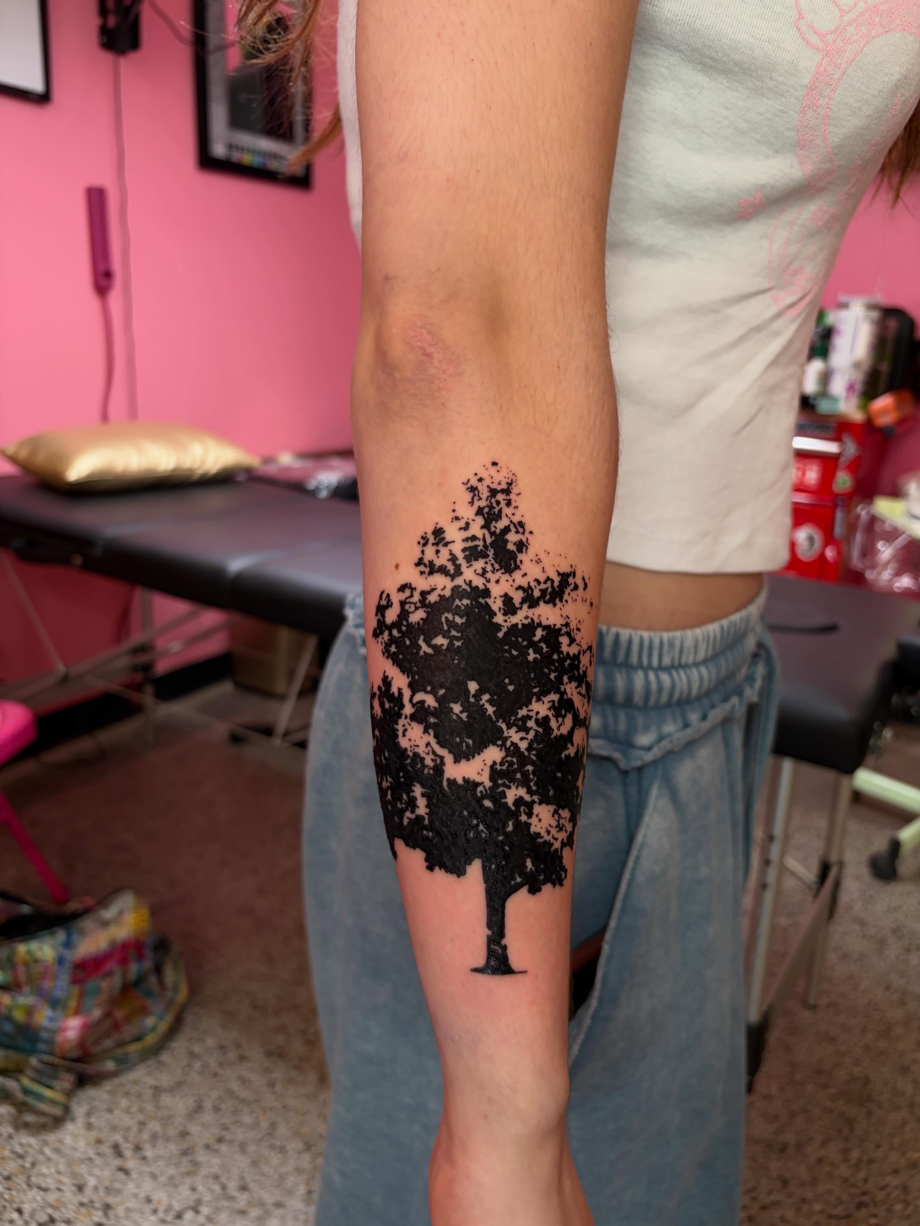 Tree black and grey tattoo on the forearm by neal