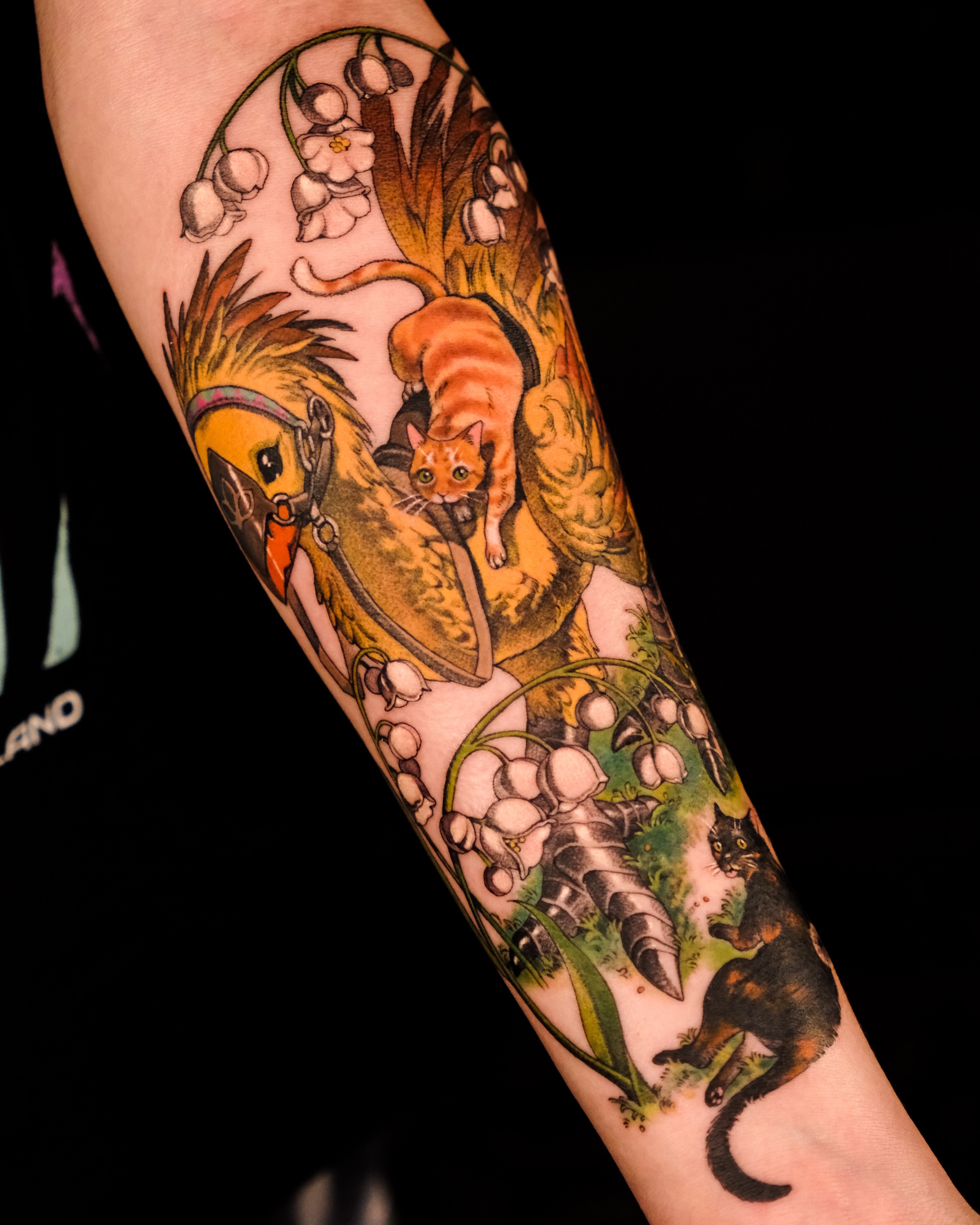 Cat and flowers realism tattoo on the forearm by Hemi 혜미타투