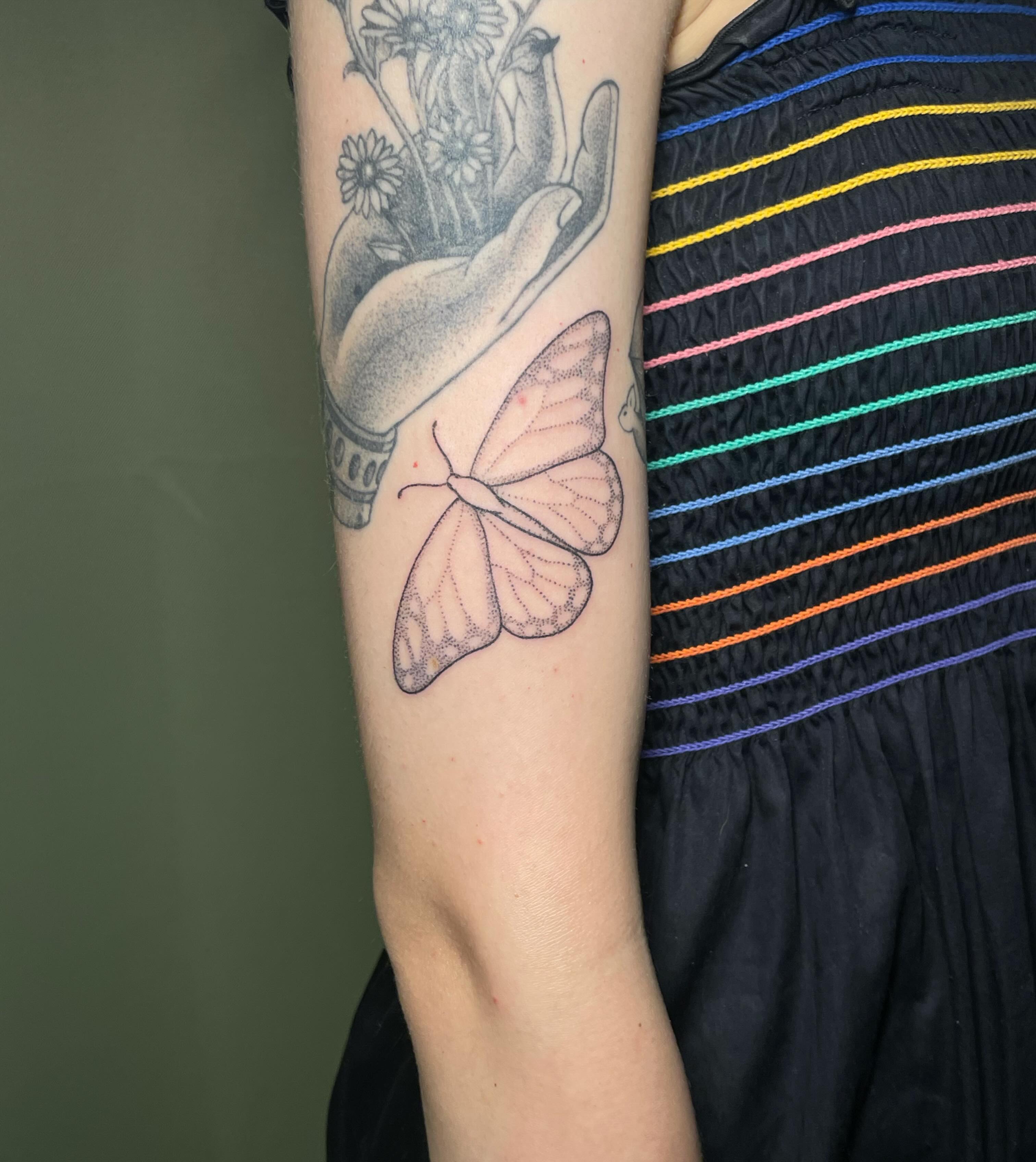 Butterfly dotwork tattoo on the forearm by Quin
