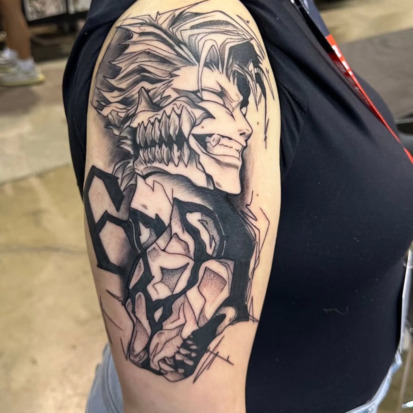 Lion geometric tattoo on the shoulder by BeardedMoney