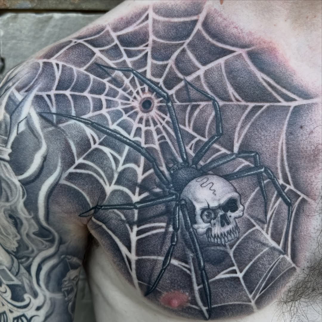 Spider web with skull realism tattoo on the chest by 𝕷𝖚𝖎𝖘 𝕲ü𝖊𝖗𝖊𝖈𝖆