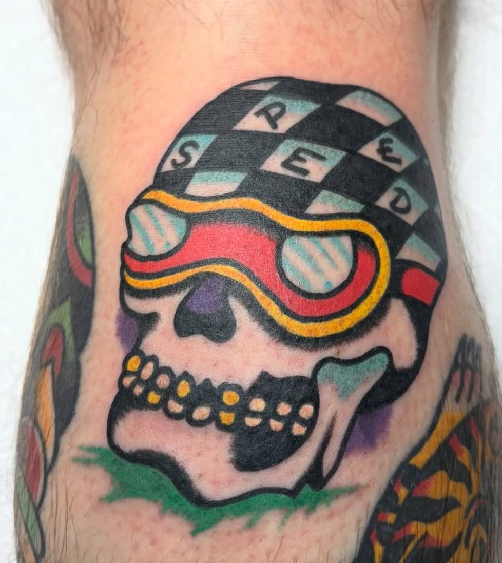 Skull with goggles American traditional tattoo on the forearm by Jake Herbert, Knoxville, Tennessee