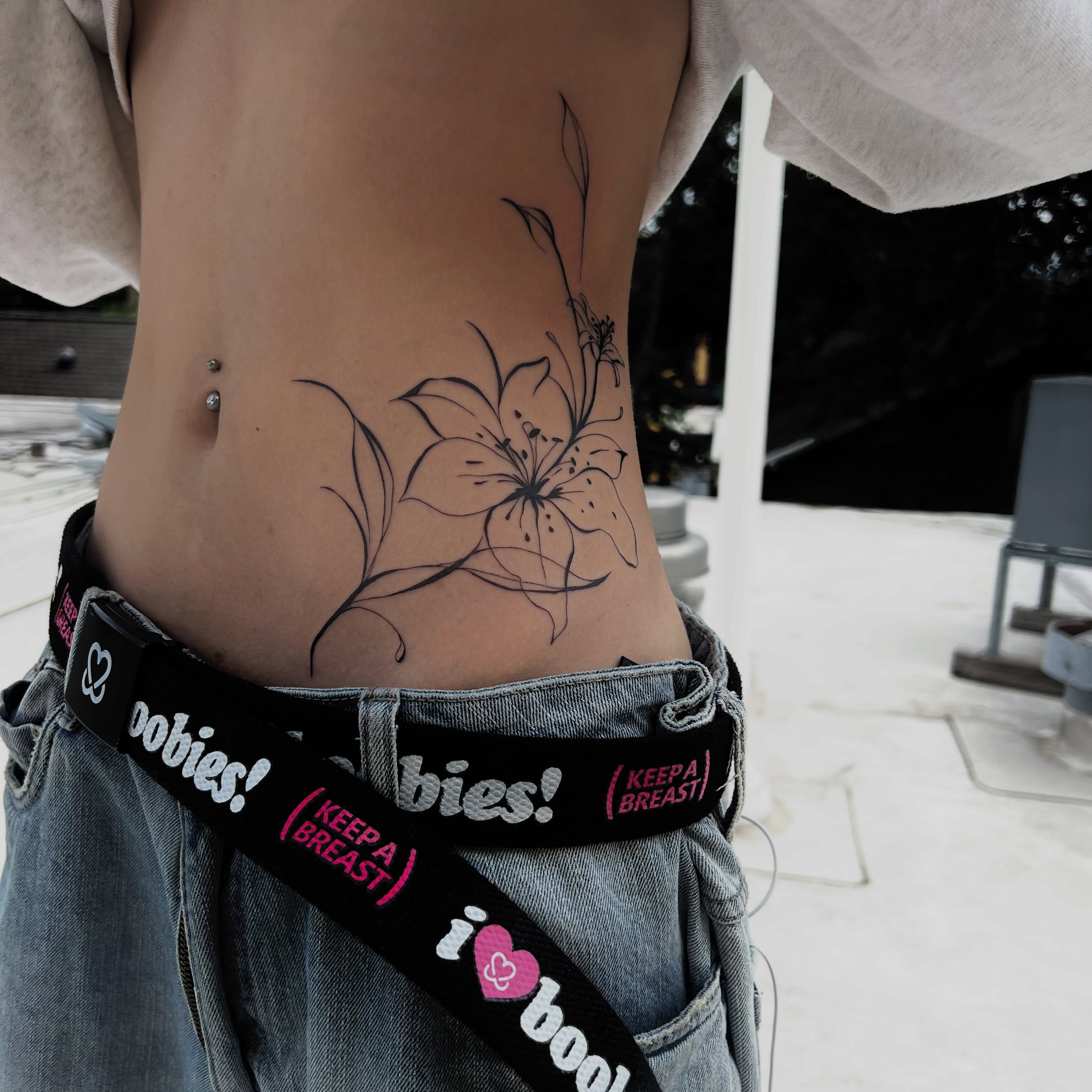 Lily black and grey tattoo on the ribs by syiko ☆ 。・:*˚:✧。, Austin, Texas