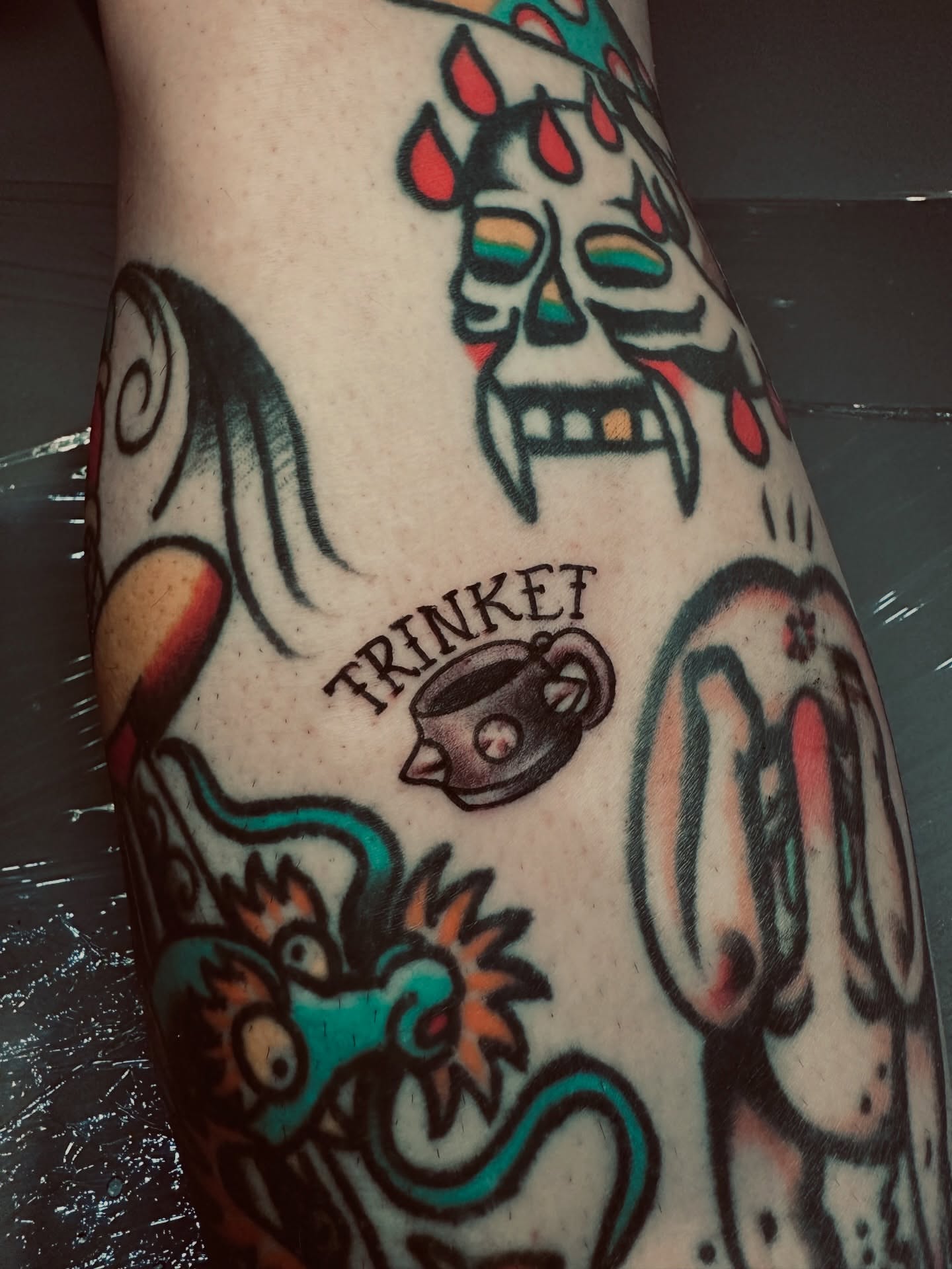 Coffee cup American traditional tattoo on the forearm by Teddi Garson