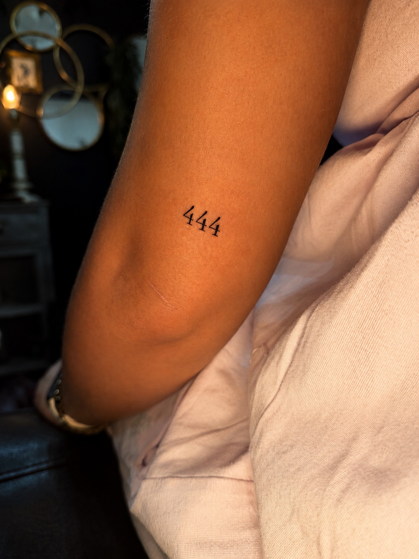 Number 444 lettering script tattoo on the forearm by JAmy Winters