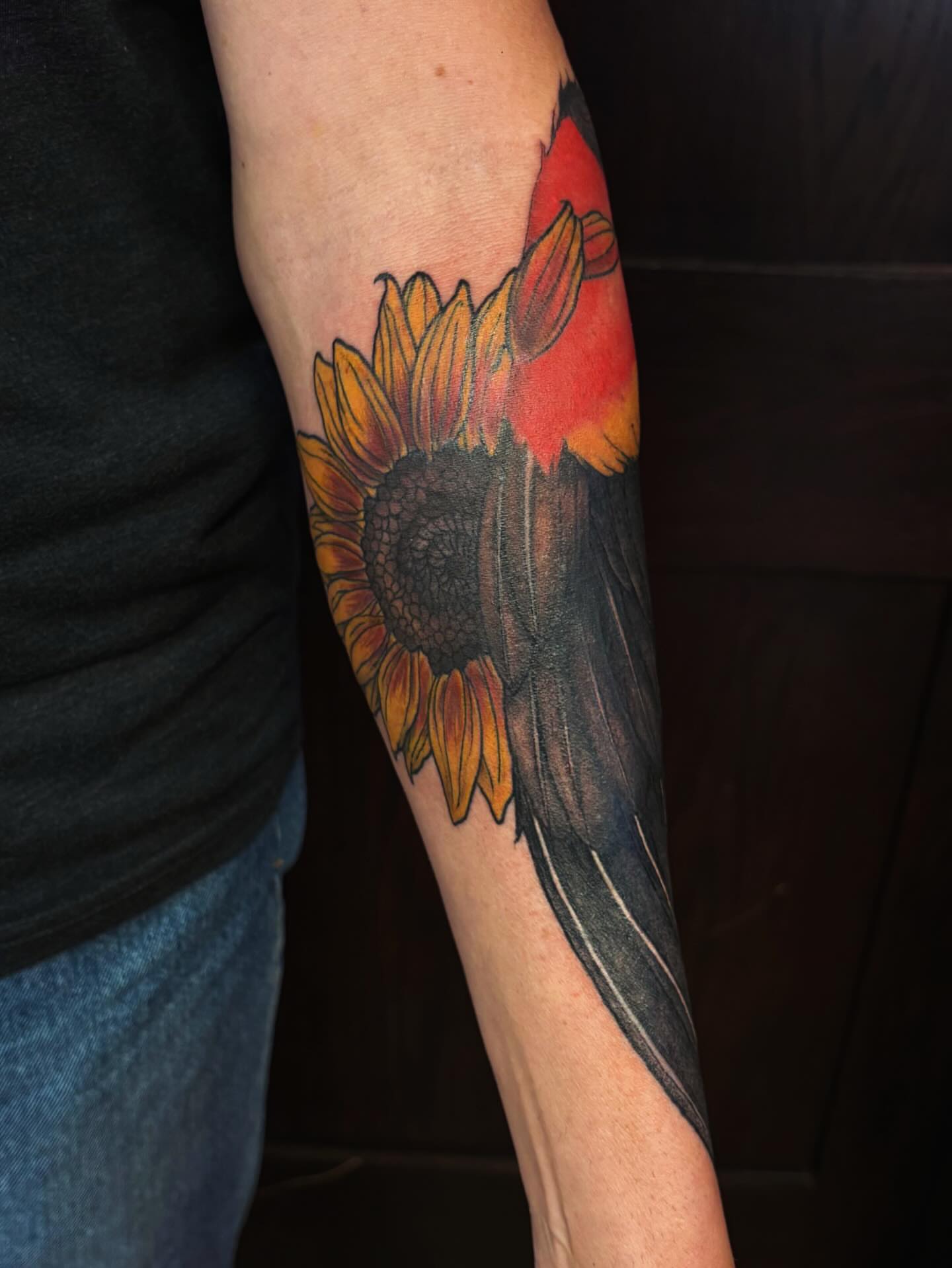 Sunflower and bird realism tattoo on the forearm by kane
