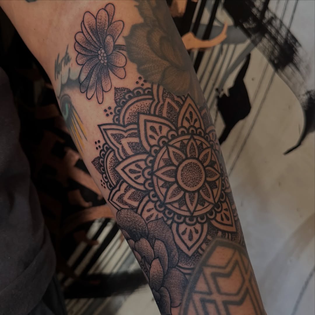 Mandala and flower ornamental tattoo on the forearm by Lisa Nikolopoulos, New York, New York