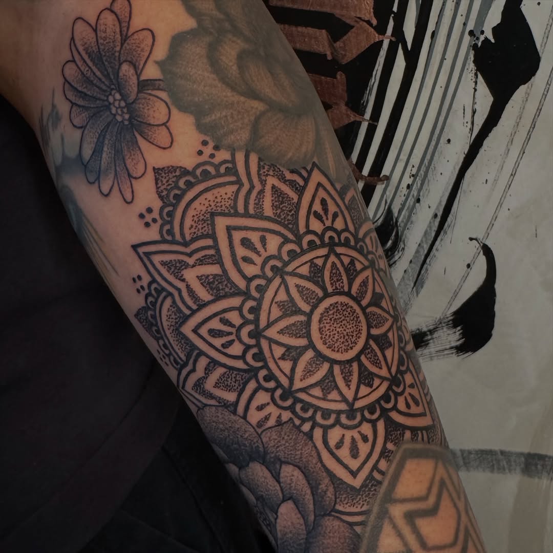 Mandala and flower geometric tattoo on the forearm by Lisa Nikolopoulos, New York, New York