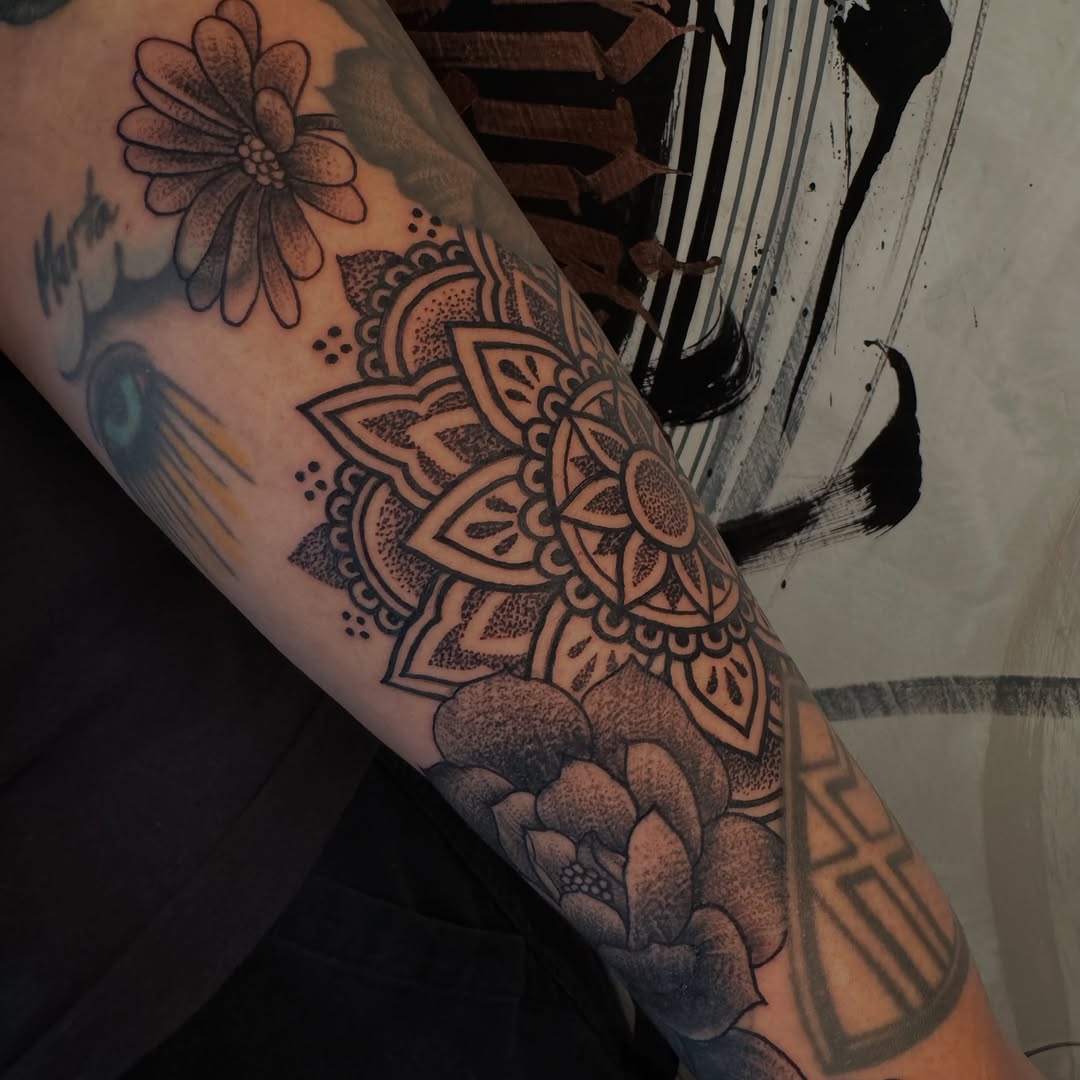 Mandala and flowers ornamental tattoo on the forearm by Lisa Nikolopoulos, New York, New York