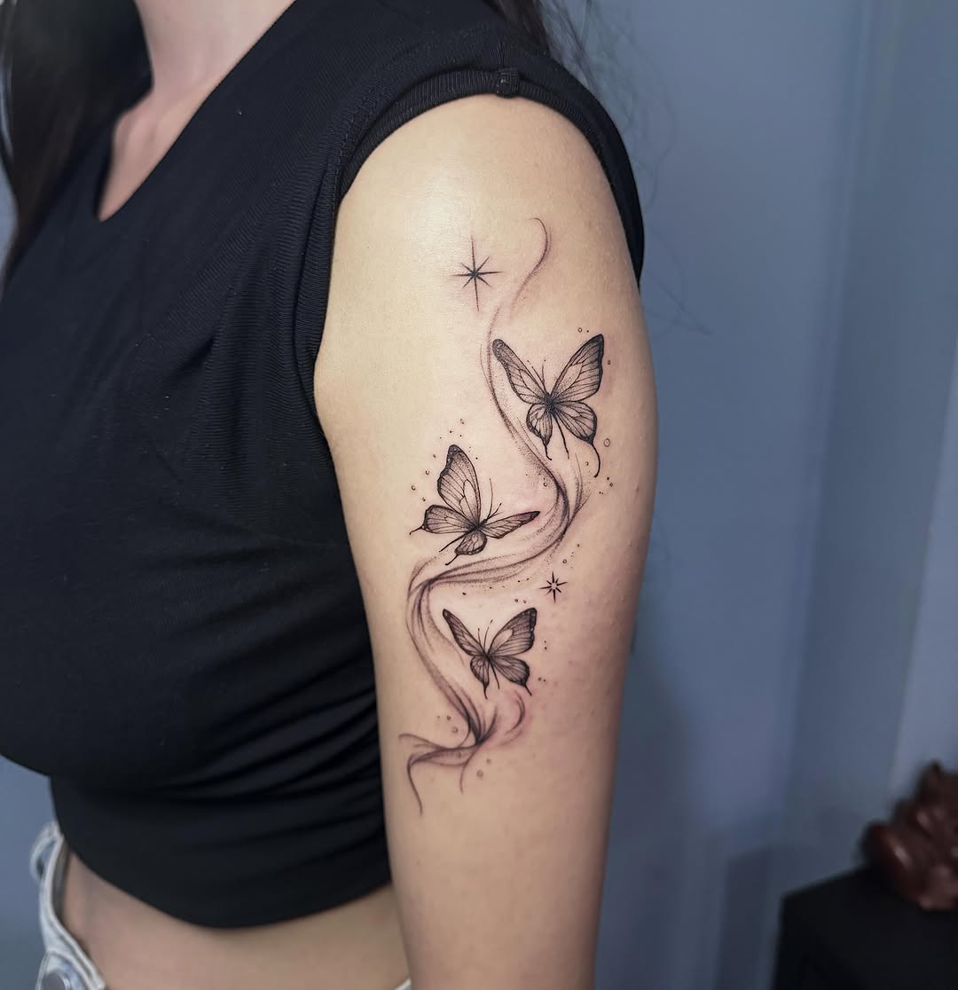 Butterflies black and grey tattoo on the upper arm by 墨匠紋身|新店店, New Taipei City