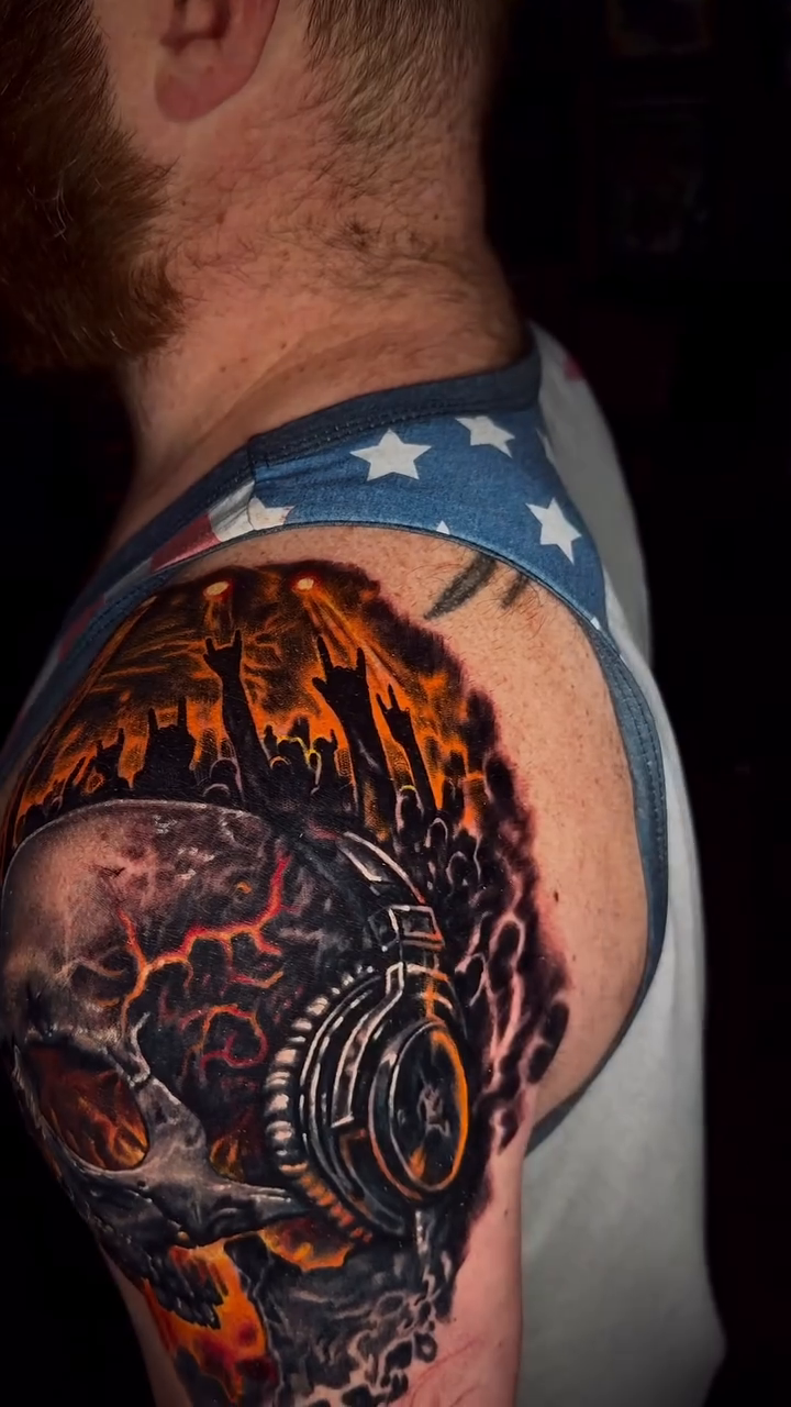 Skull with headphones realism tattoo by Michael brown