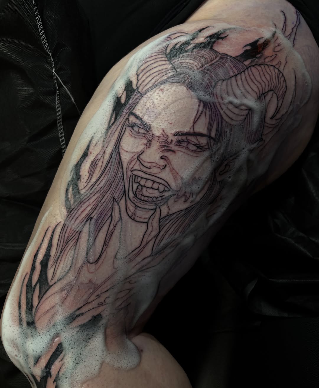 Angry woman realism tattoo on the forearm by Sofia Rose