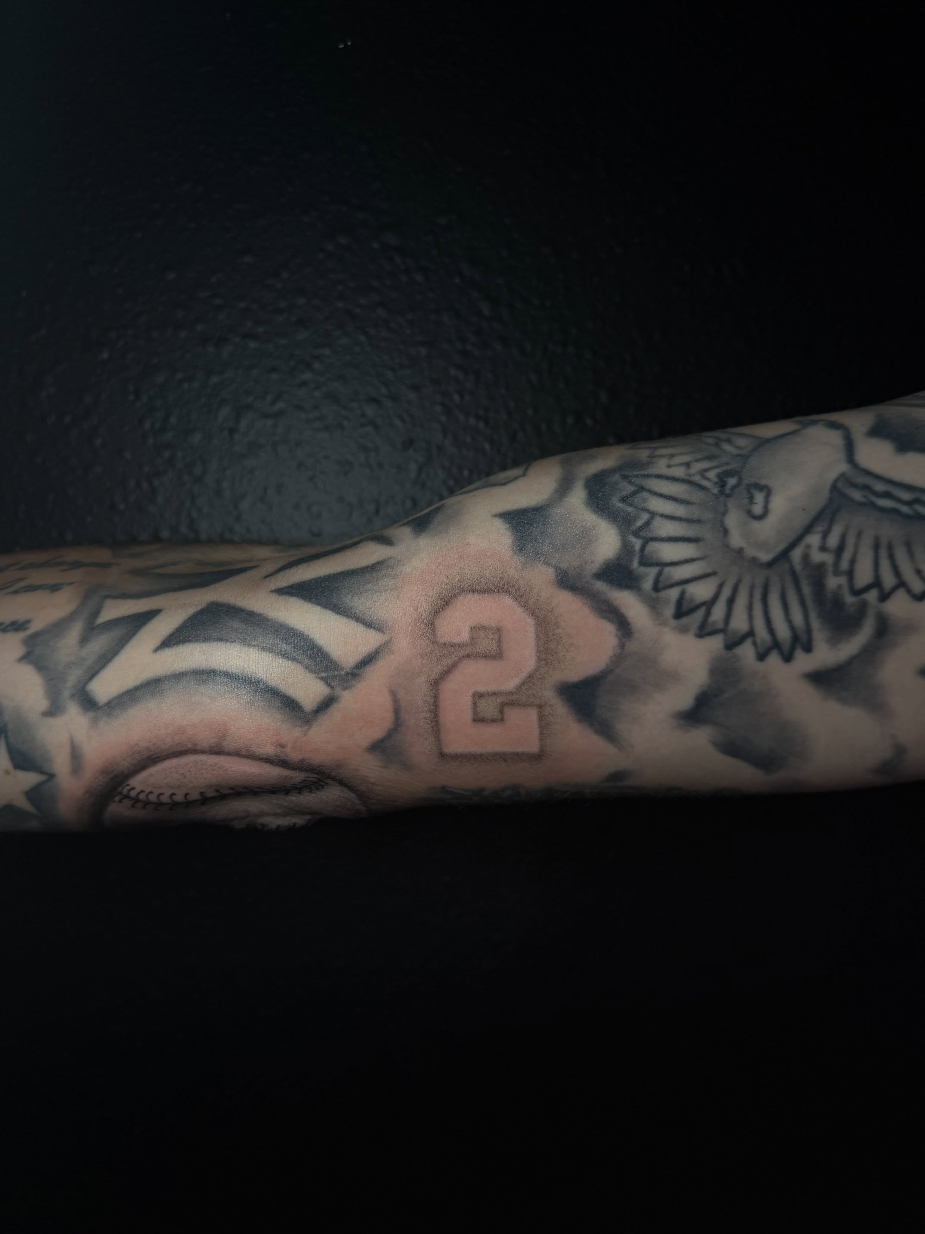 Baseball and eagle American traditional tattoo on the forearm by Ink Darling, Carlisle, Iowa