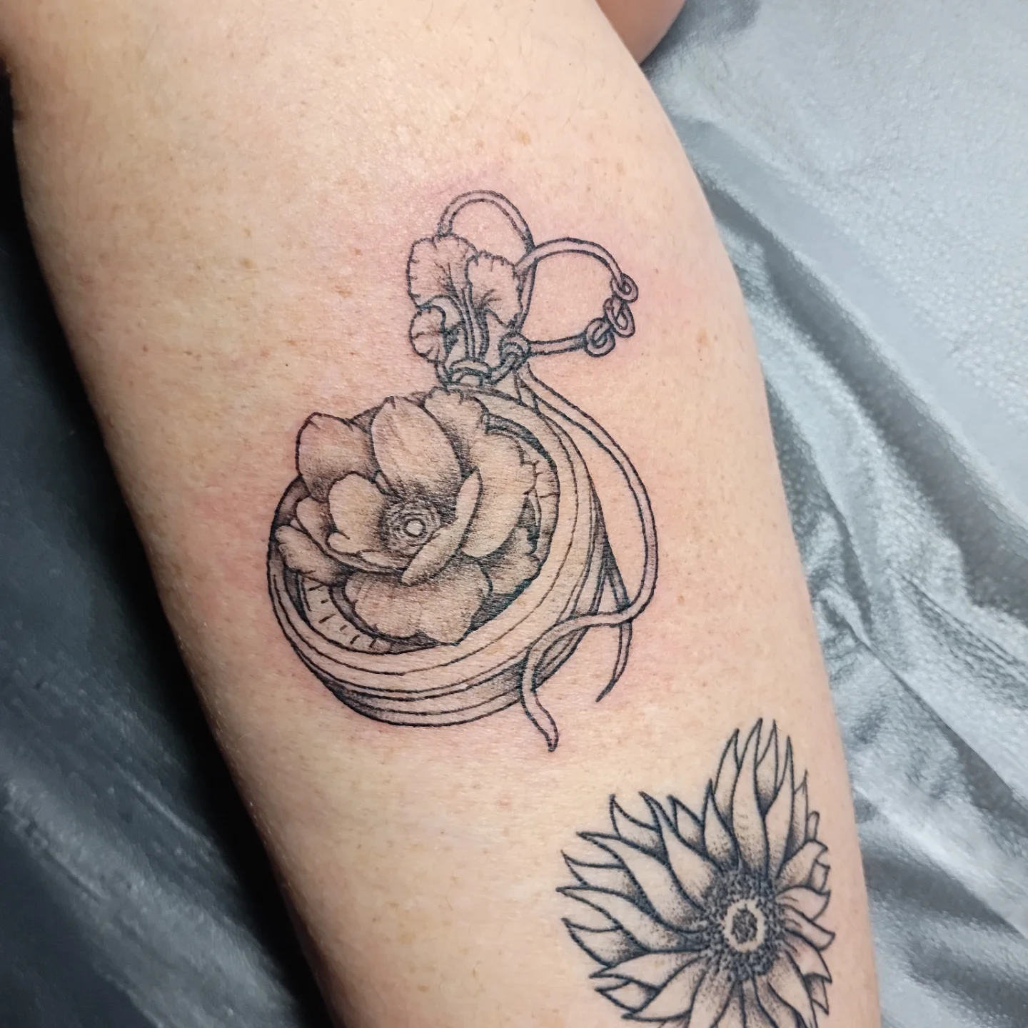 Flower in vase dotwork tattoo on the forearm by Tiffany