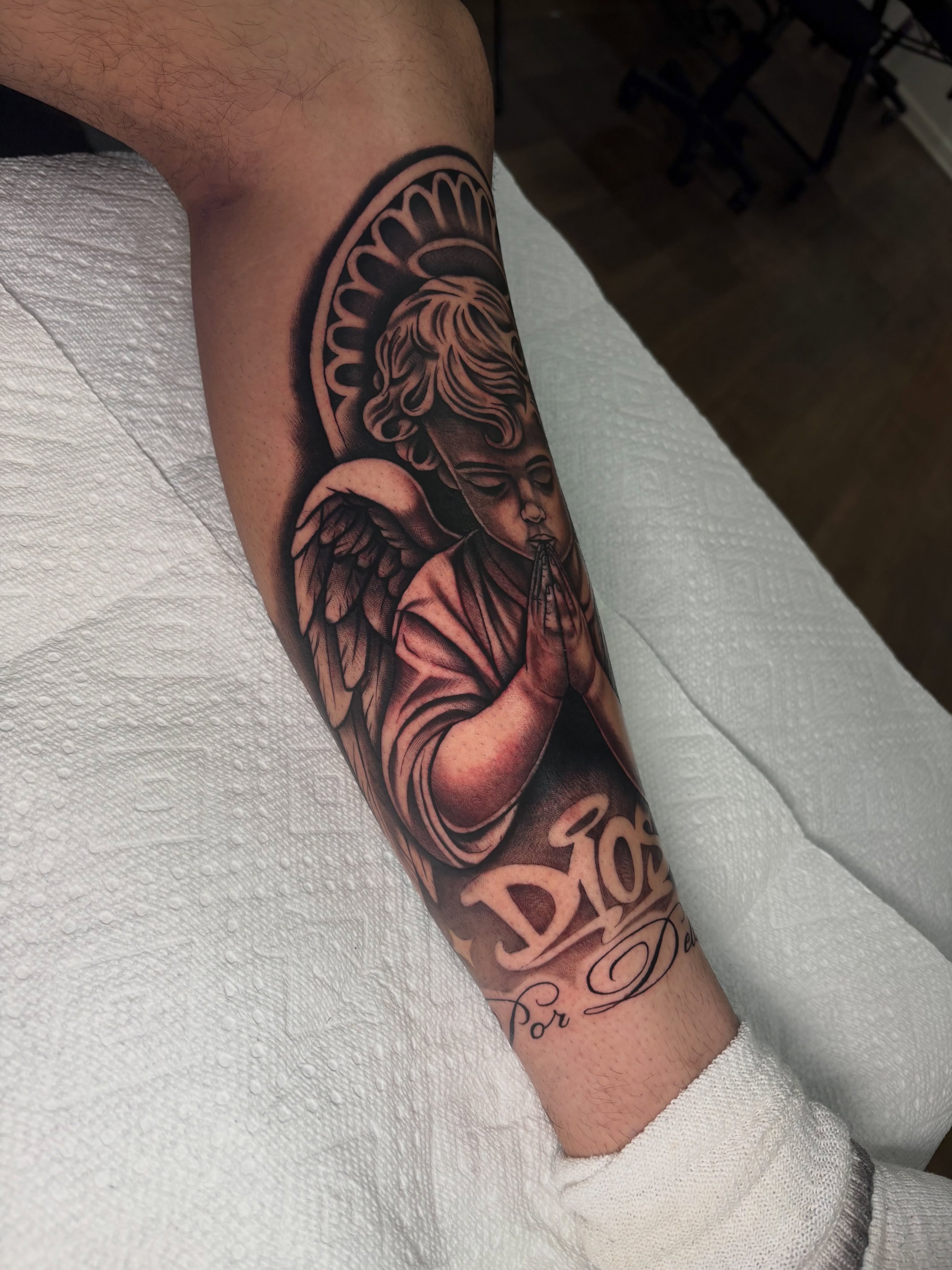 Tattoo by @osieltattoos — black_and_grey, realism