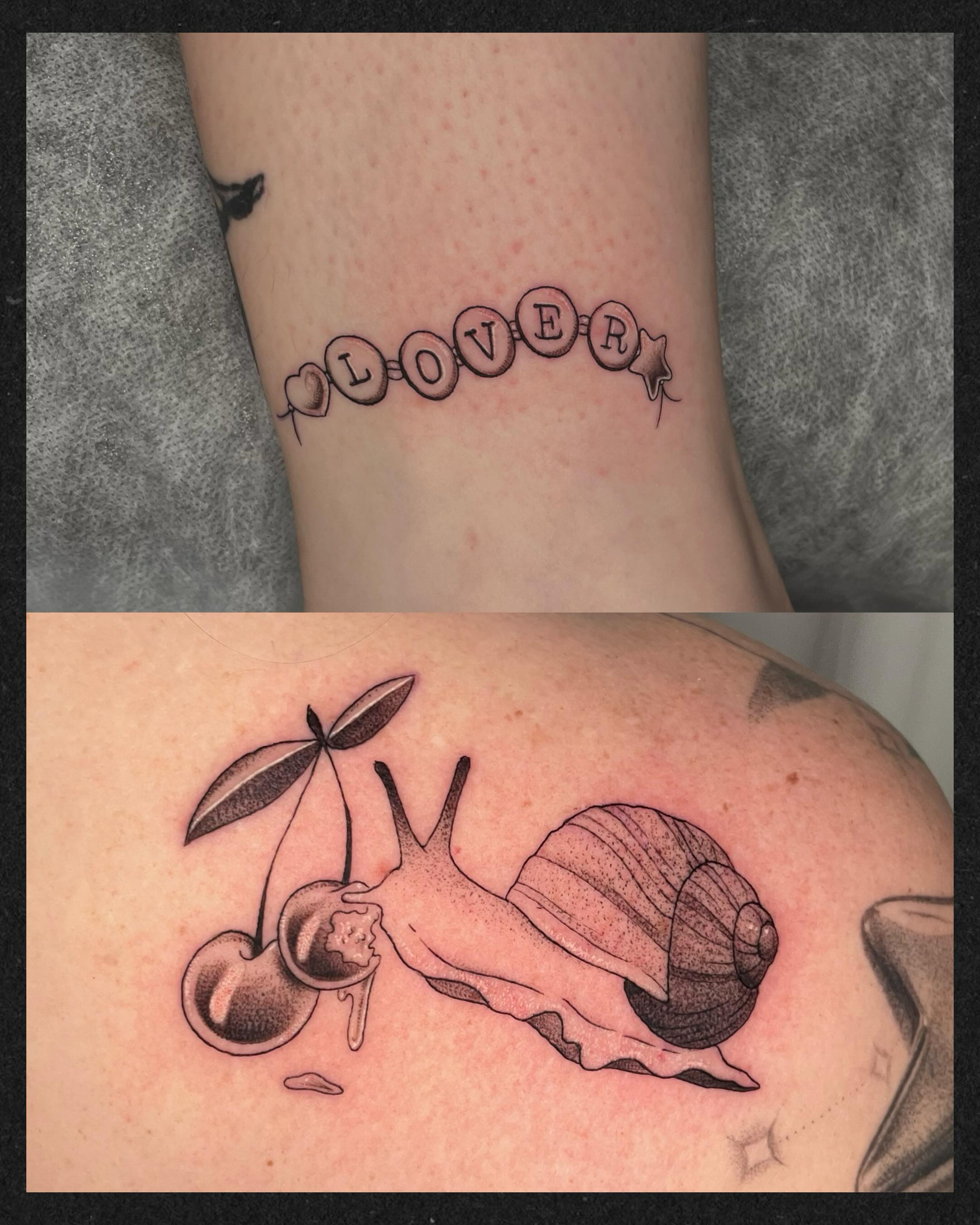 Snail eating cherries realism tattoo on the shoulder by Sam chase, Naperville, Illinois