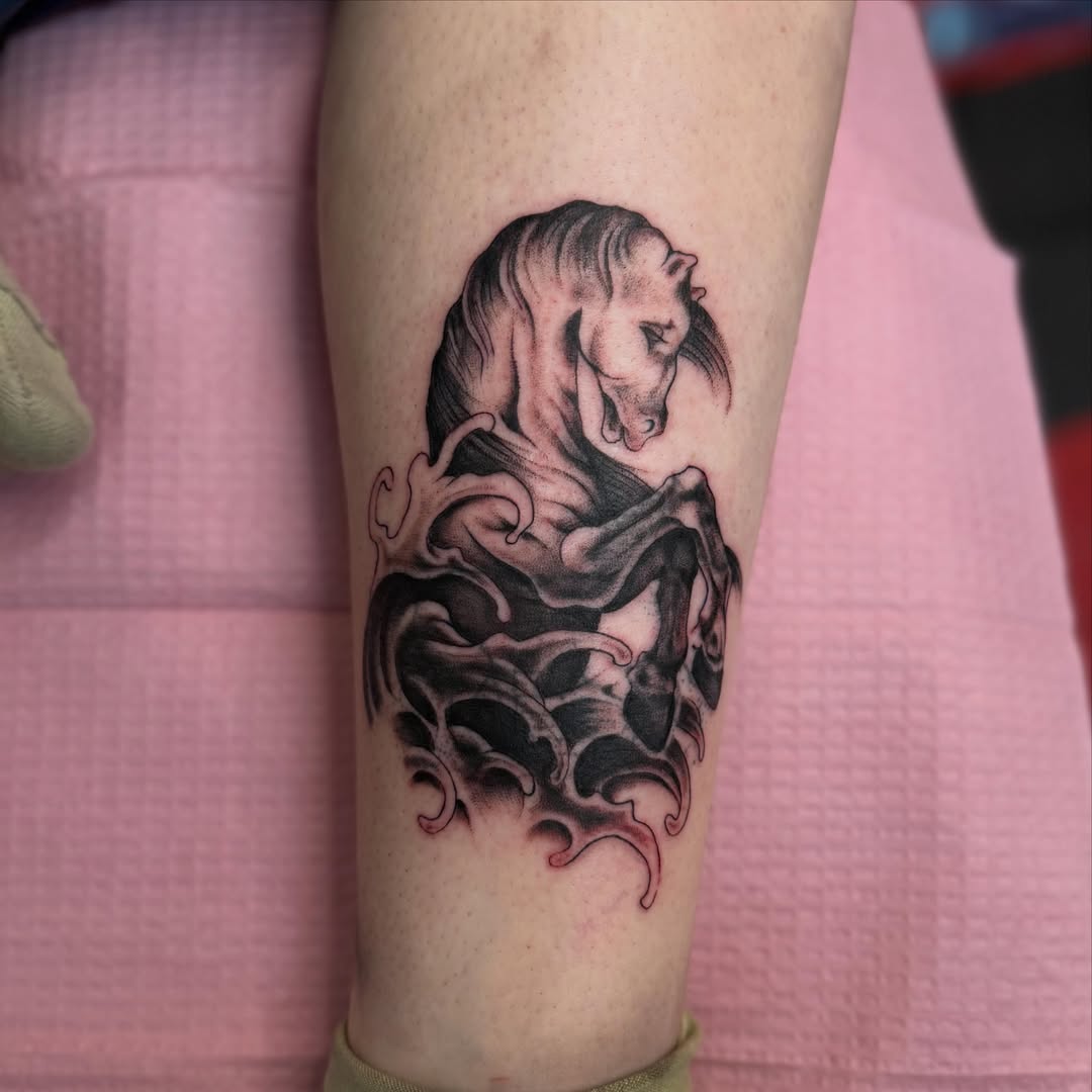 Horse black and grey tattoo on the forearm by clay🚀