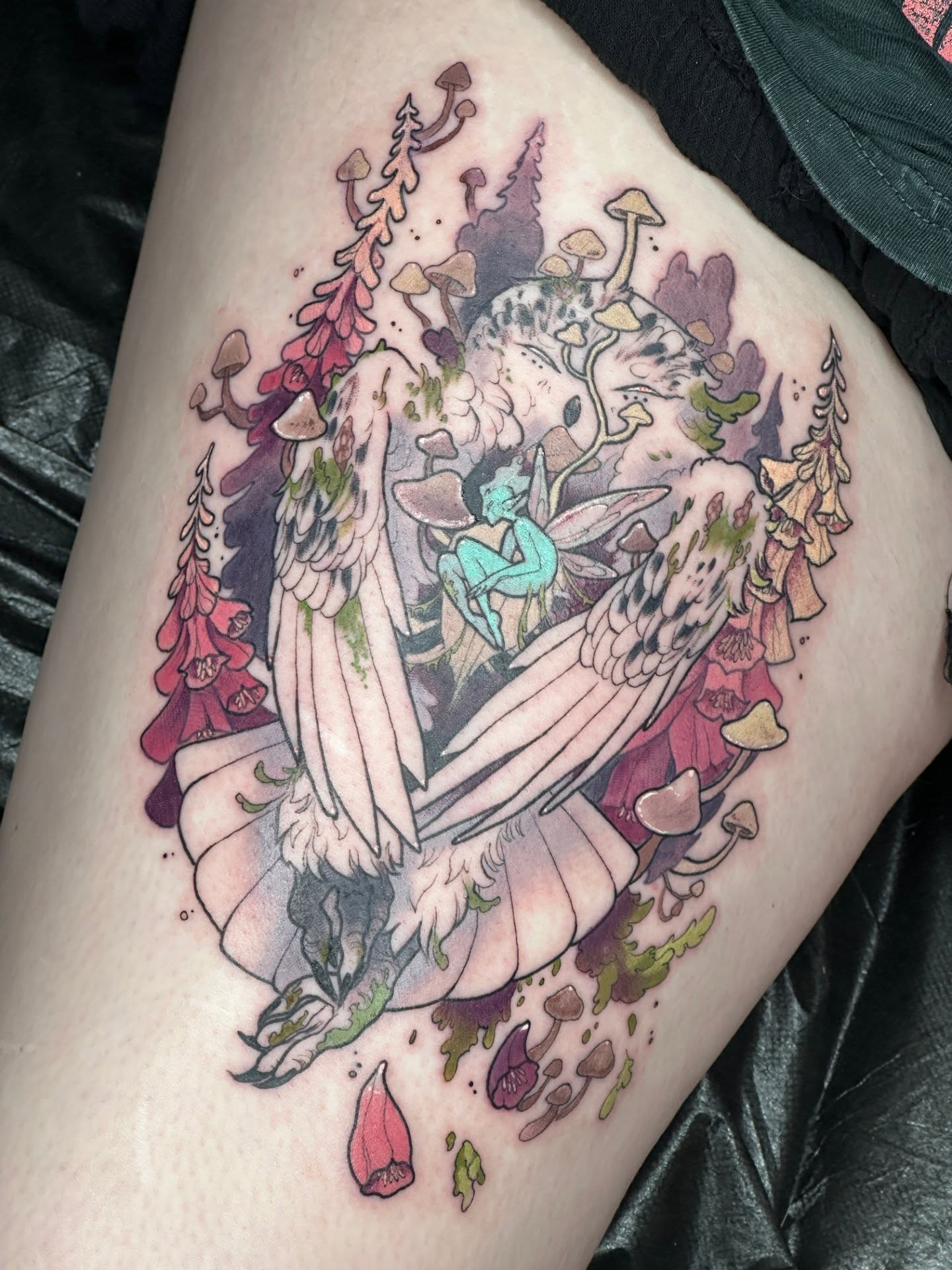 Fairy in forest watercolor tattoo on the thigh by Sasha Wren
