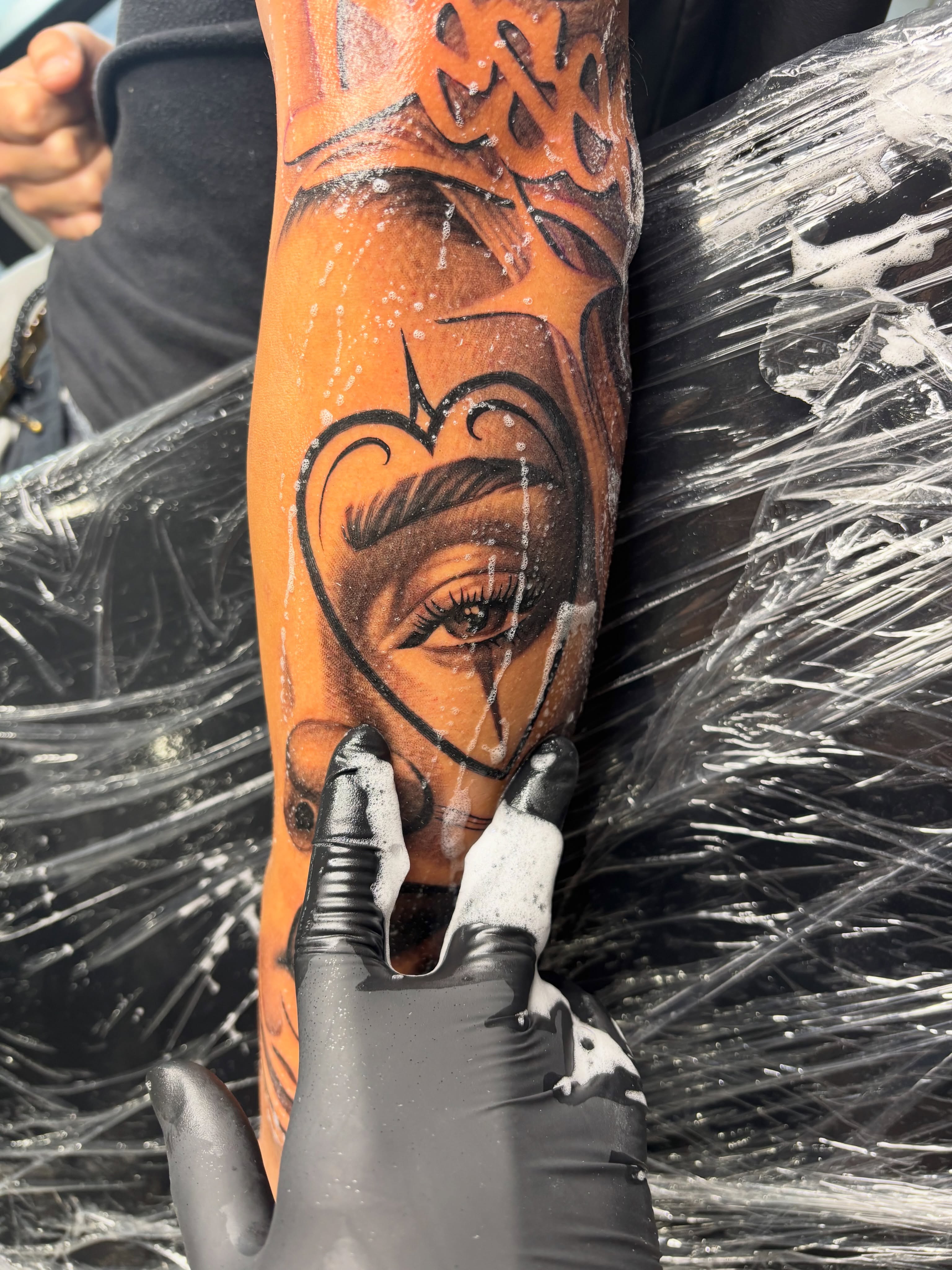 Woman's face realism tattoo on the forearm by Crooks Ink ✞