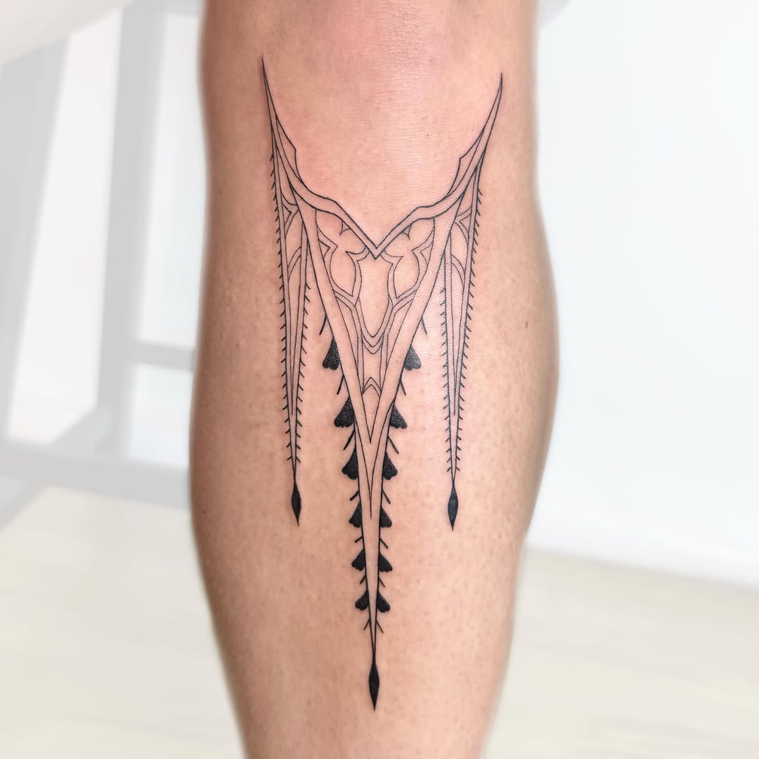Ornamental geometric design ornamental tattoo on the calf by Nika