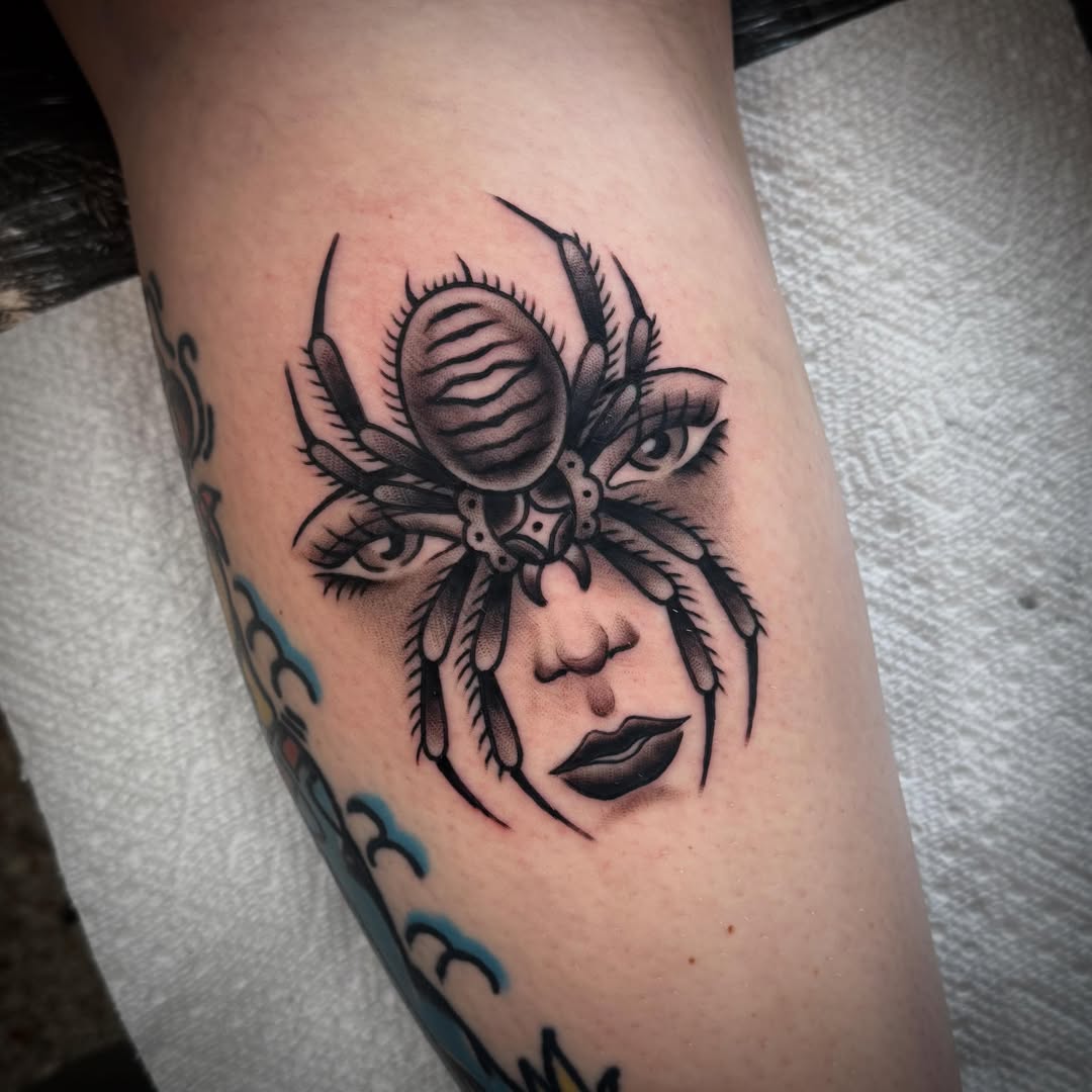 Spider and woman realism tattoo on the forearm by Graham Edward Vogel