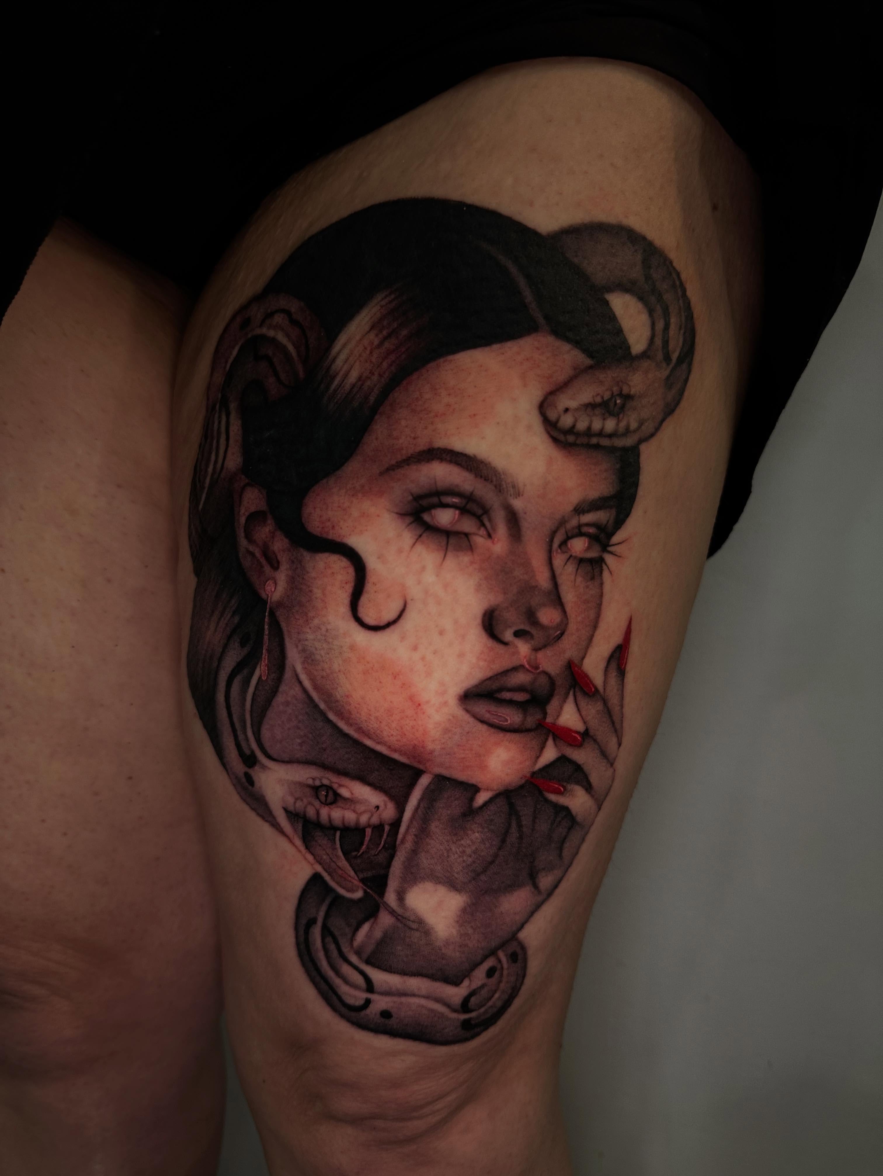 Woman with snake realism tattoo on the thigh by @piinkywabbiit, Roselle Park, New Jersey