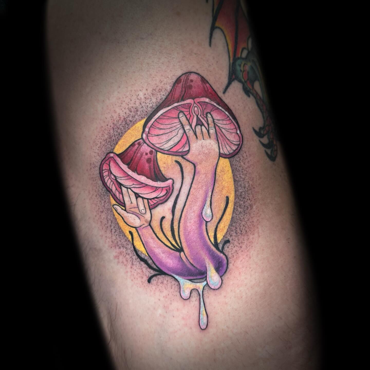 Mushrooms and hands dotwork tattoo on the thigh by Kelsea Weir McCree