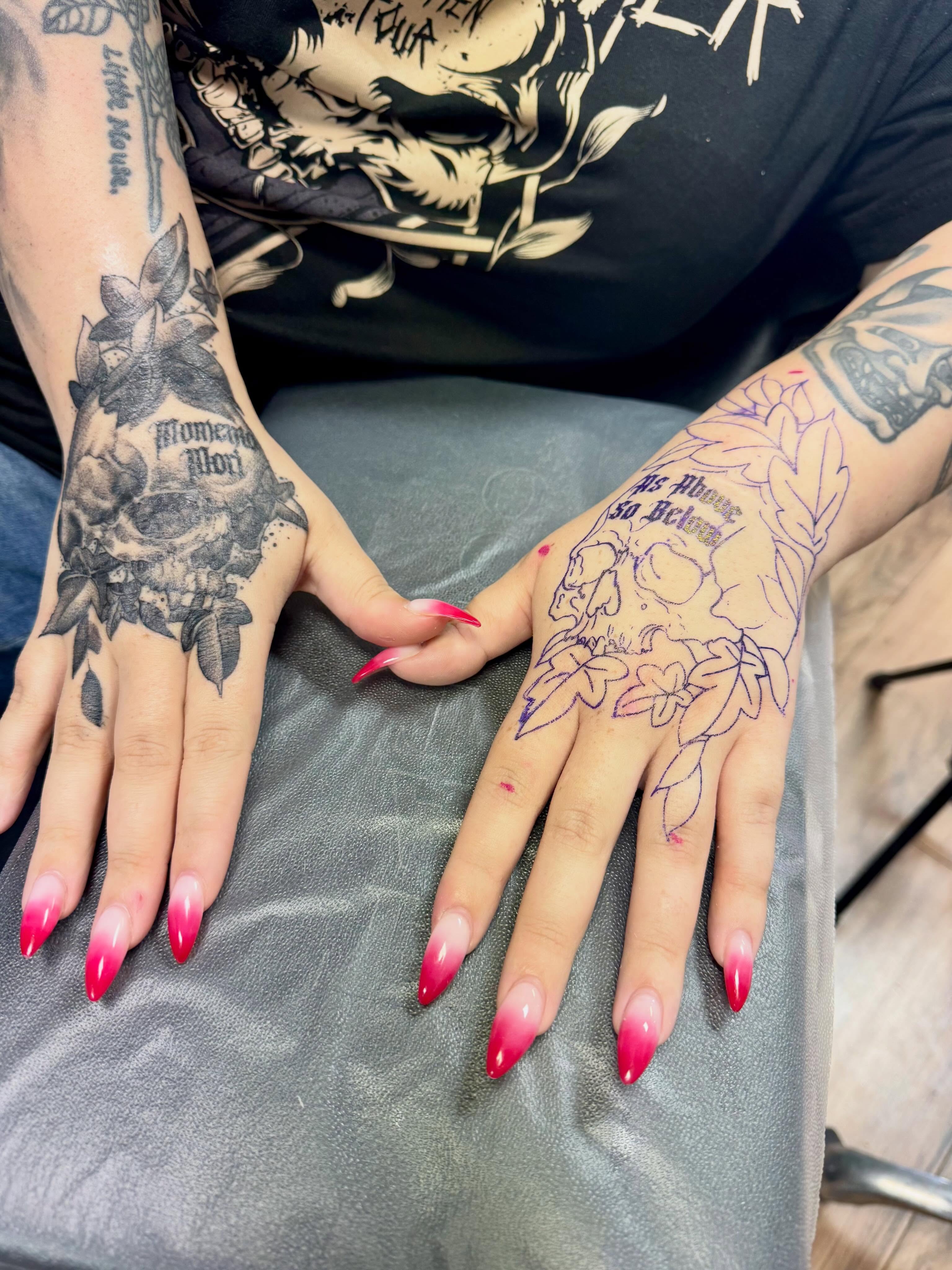 Floral design American traditional tattoo on the hand by Eileen Joyce