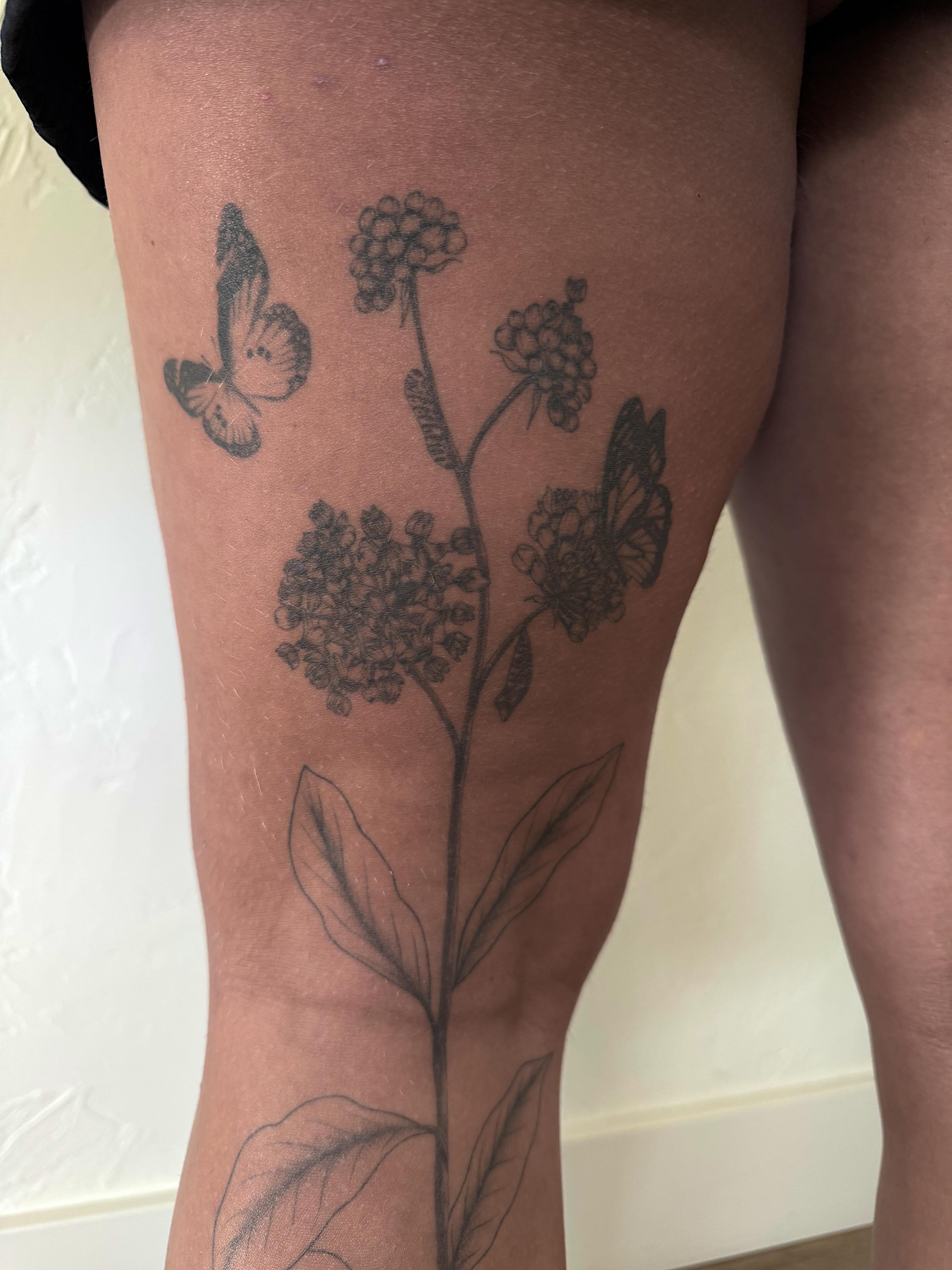 Flowers and butterflies black and grey tattoo on the thigh by Shelby Lynn Bayles, Ogden, Utah