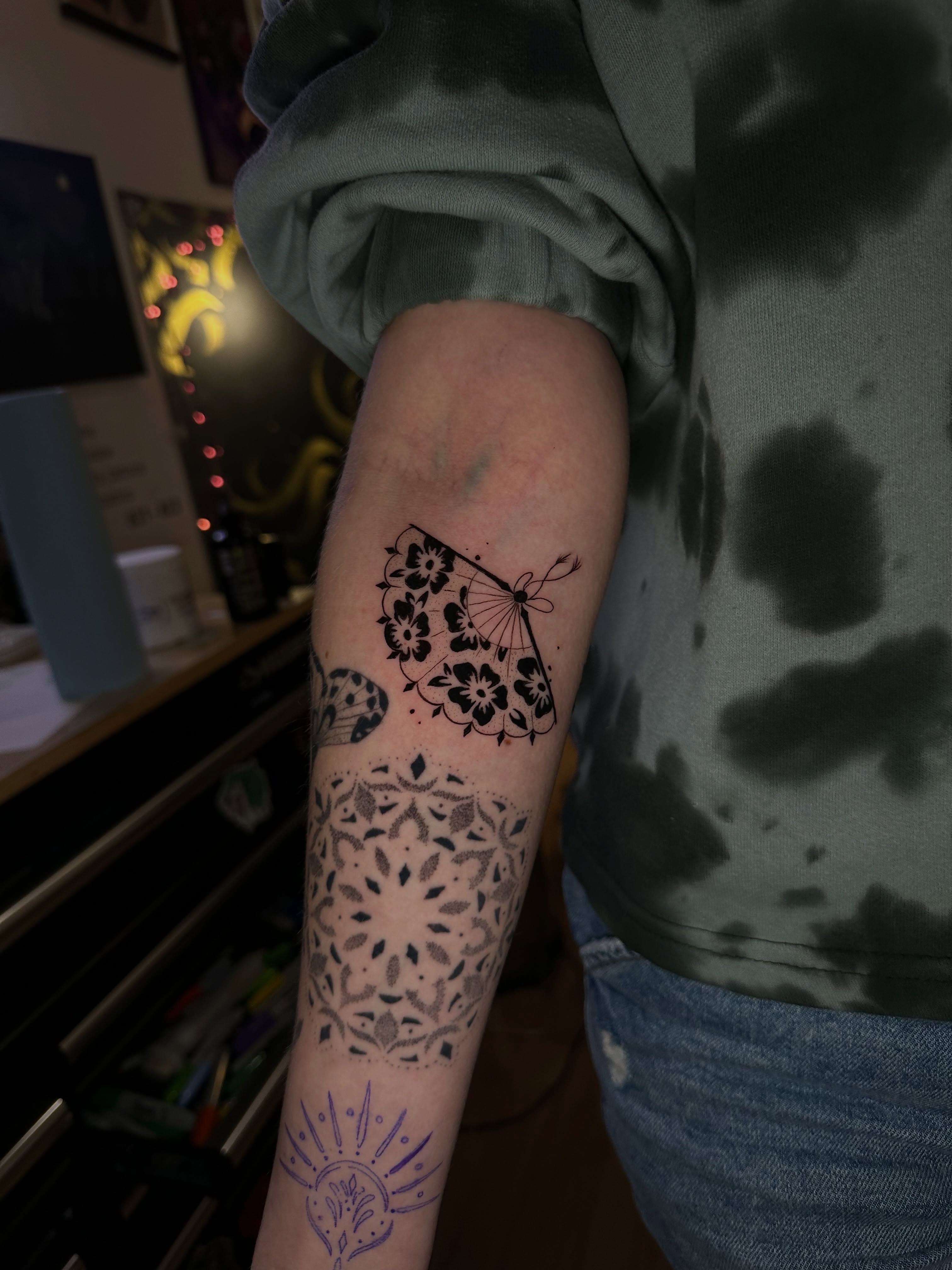 Floral mandala dotwork tattoo on the forearm by Yassin alsaje