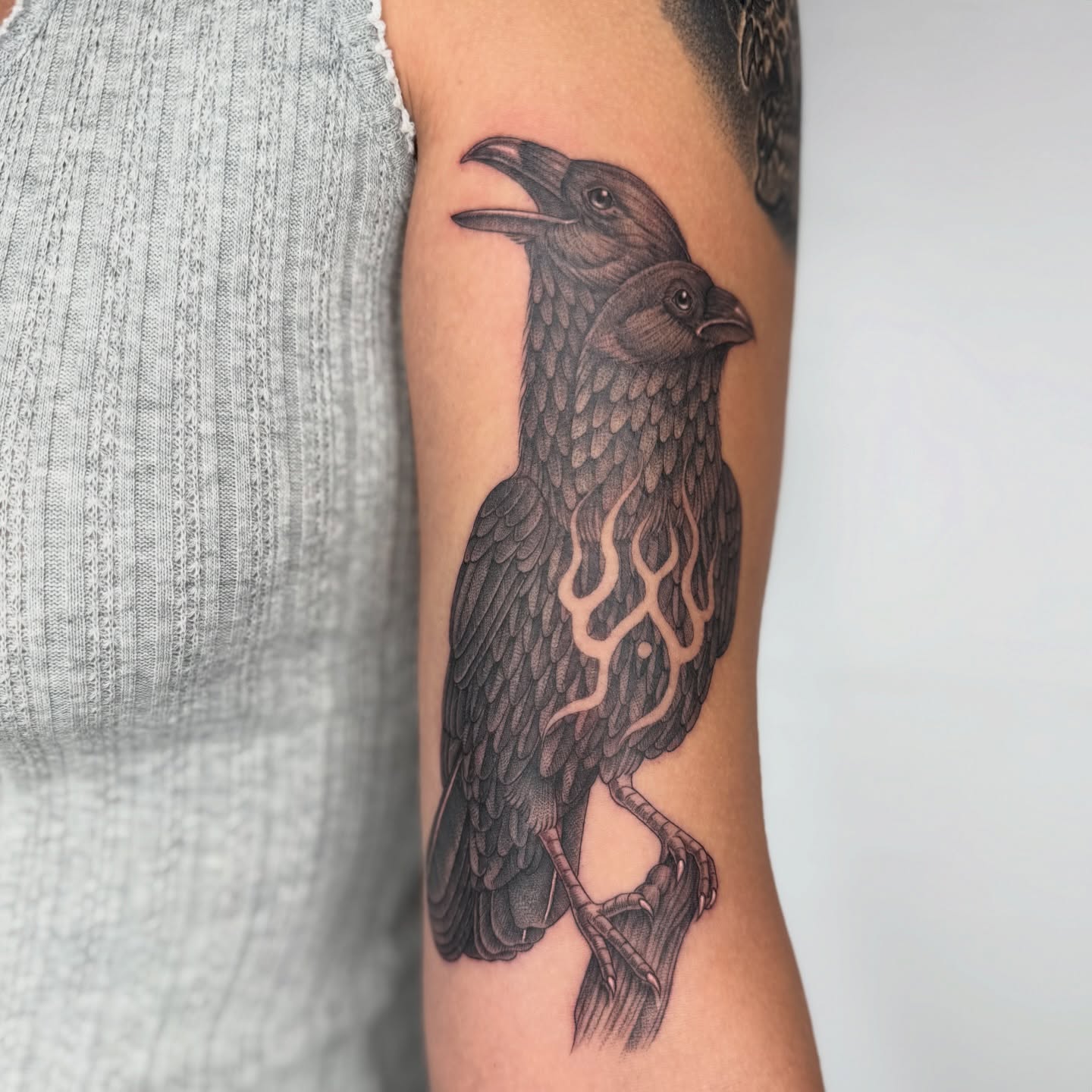 Crow realism tattoo on the forearm by Rose