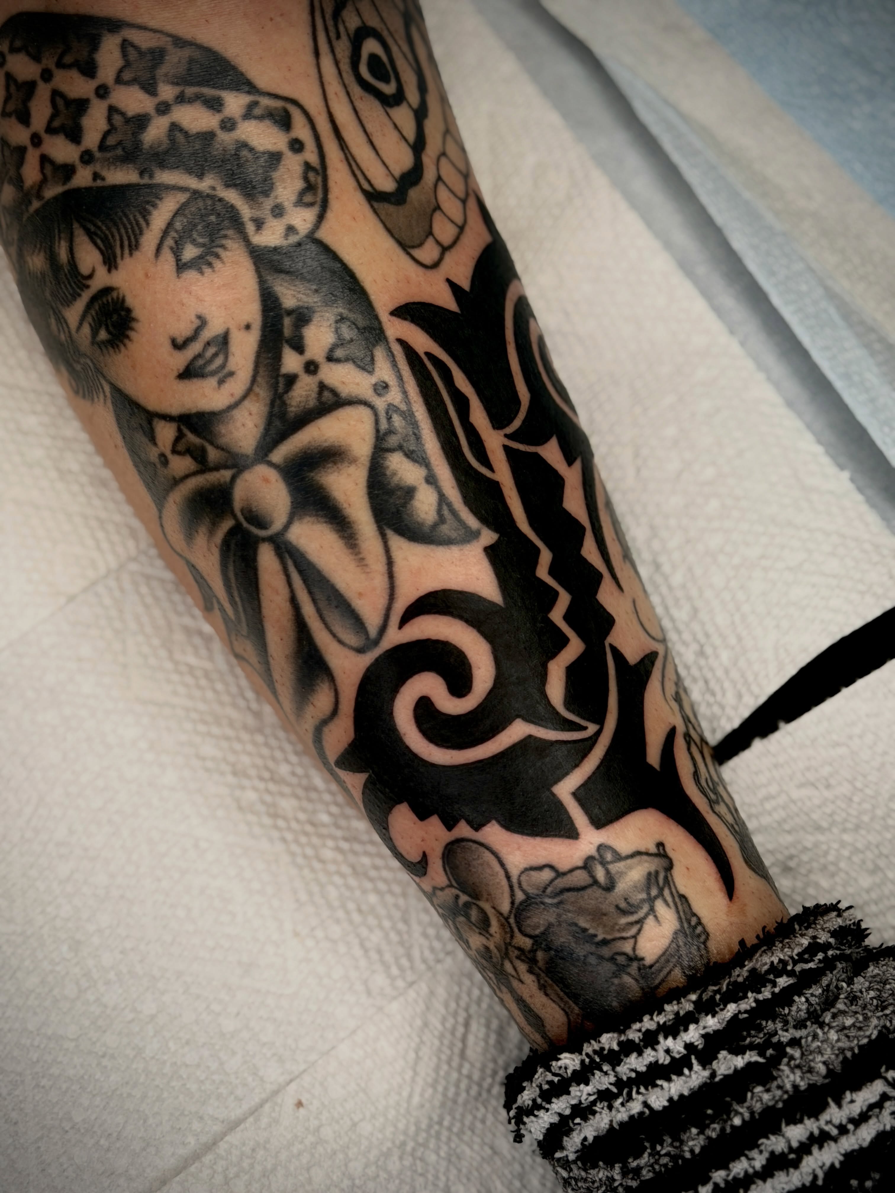 Anime girl American traditional tattoo on the forearm by Diego Treviño