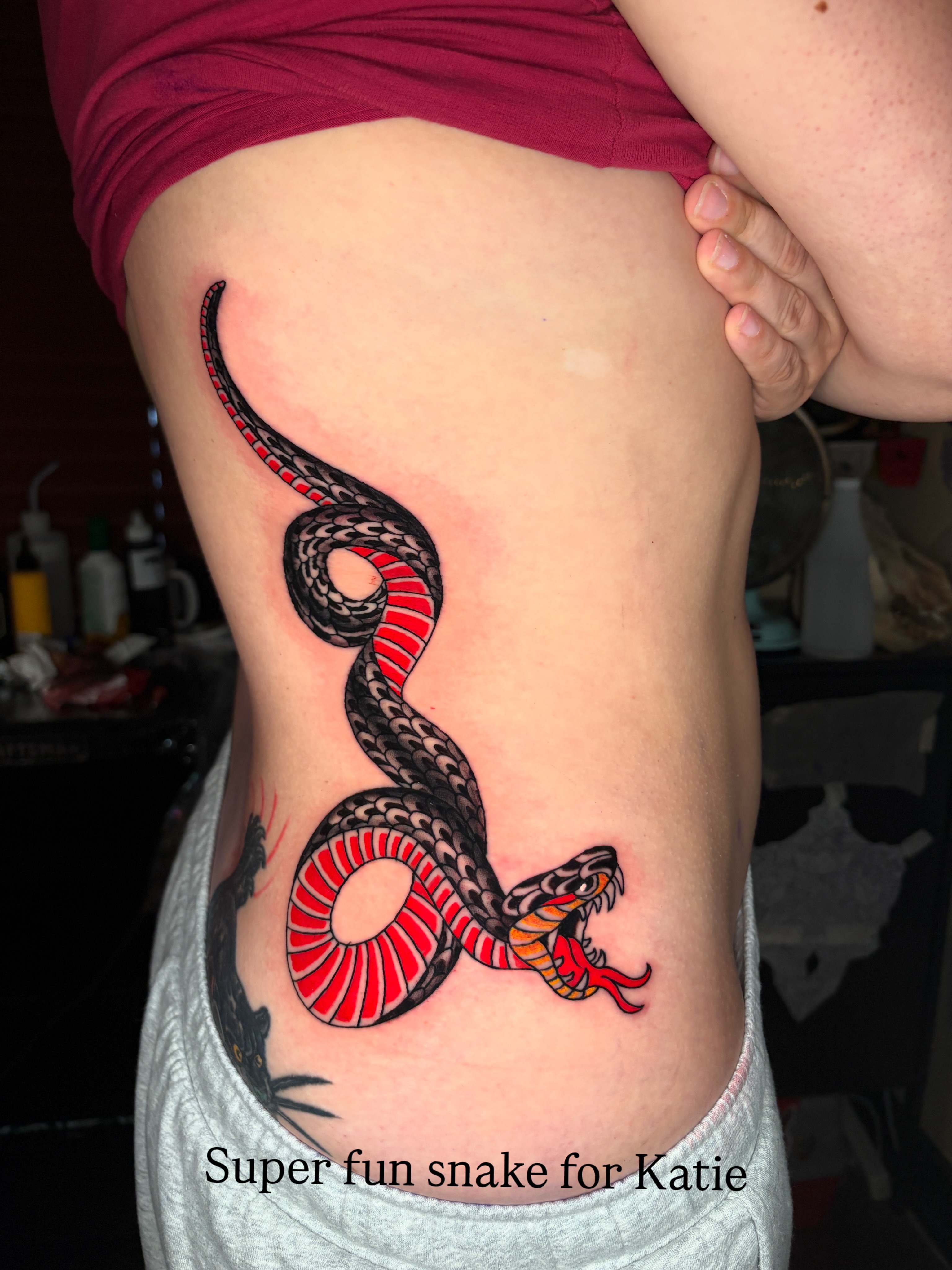 Snake American traditional tattoo on the thigh by Max Klapp, Austin, Texas