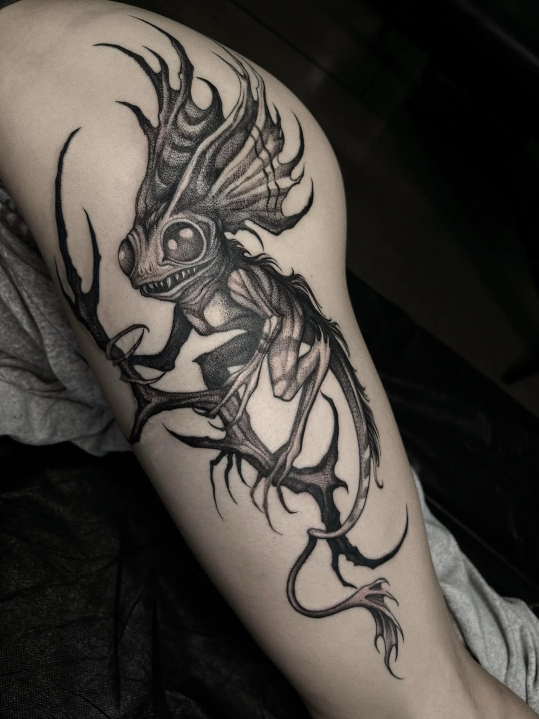 Tattoo by @haileypaetztattoos — dark_realism, black_and_grey