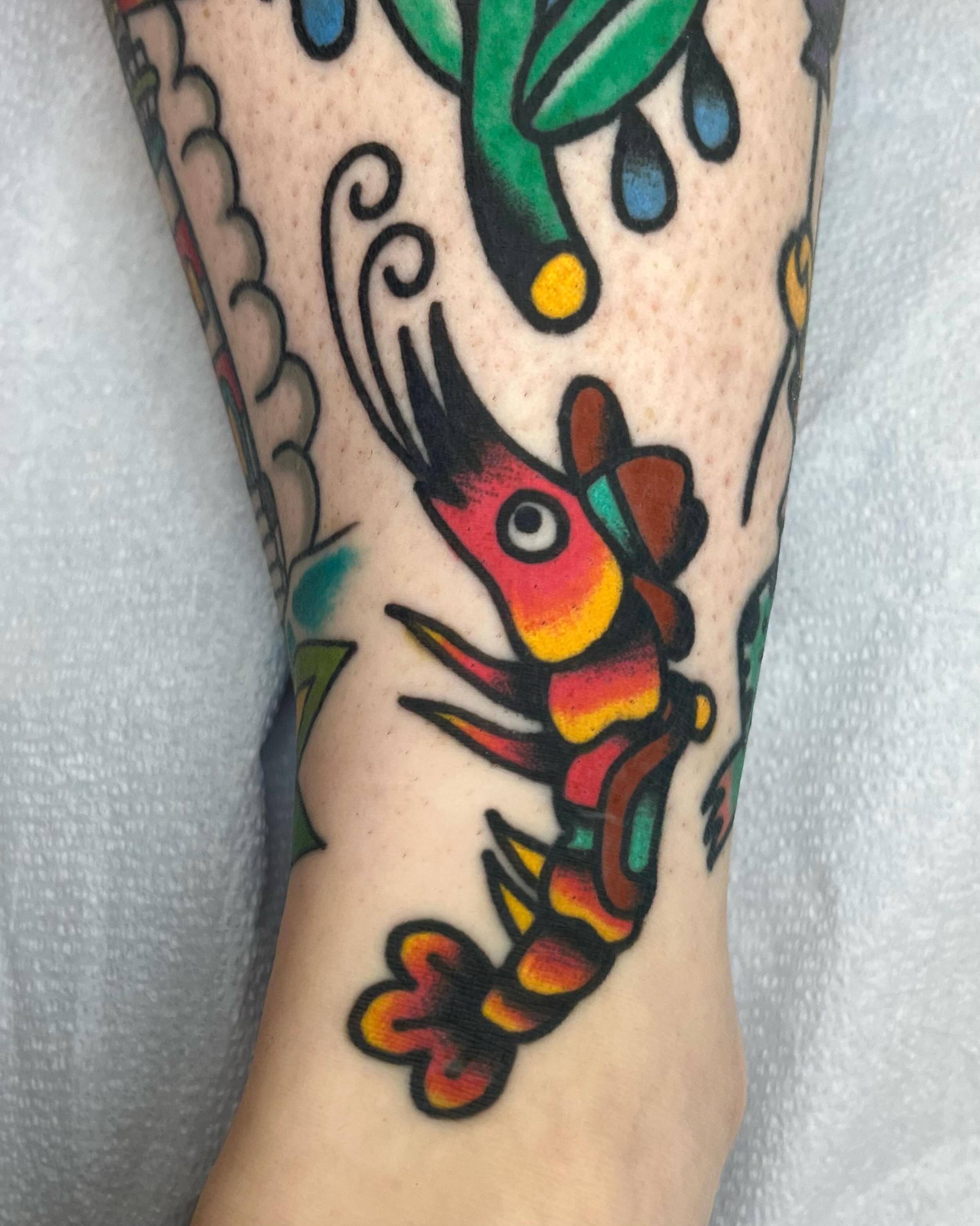 Shrimp American traditional tattoo on the forearm by Em Adkins