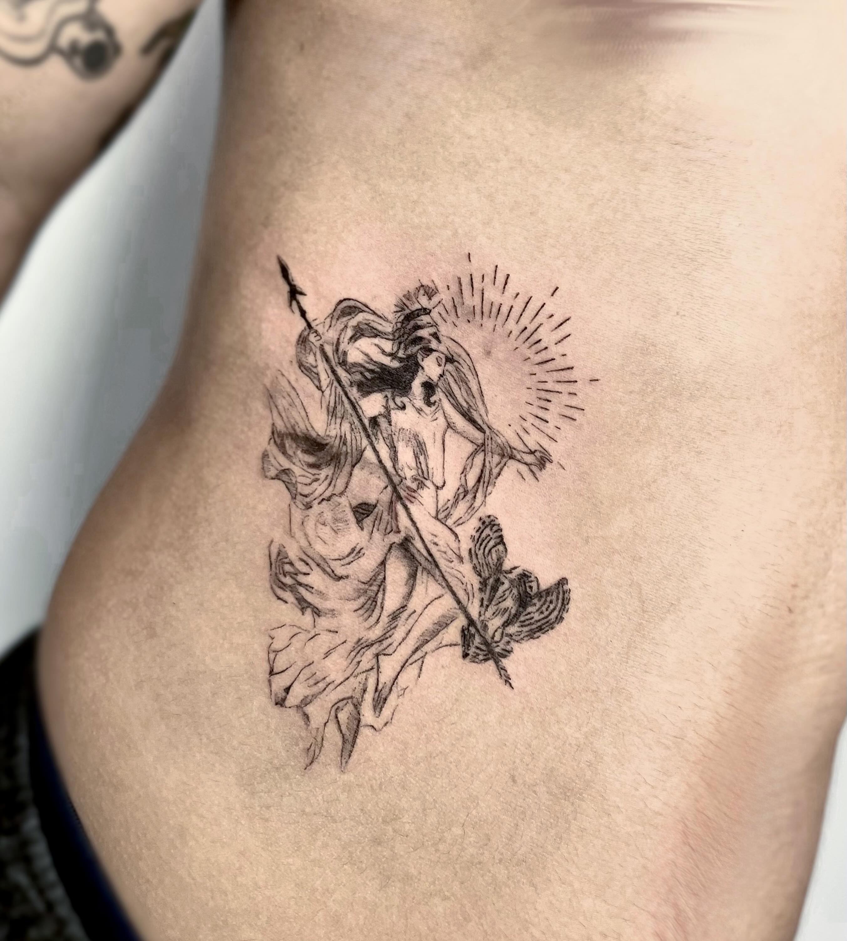 Angelic figure black and grey tattoo on the ribs by Vintage tattoo