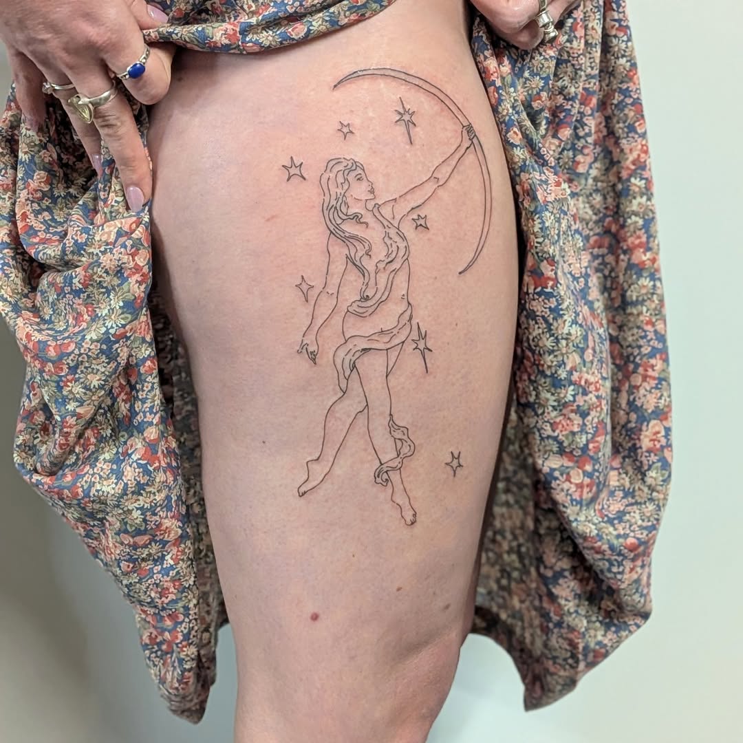 Dancer with crescent moon fine line tattoo on the thigh by Ryan