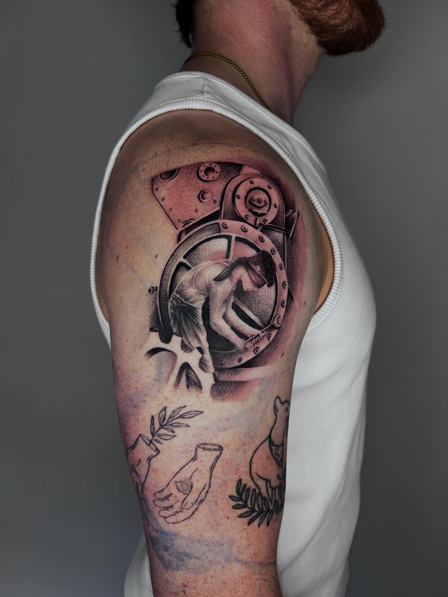 Tattoo by @dolphintattoos — black_and_grey, realism