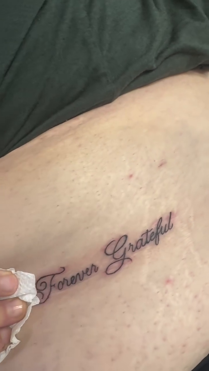 Forever Grateful text tattoo lettering tattoo on the thigh by Victoria Cooper
