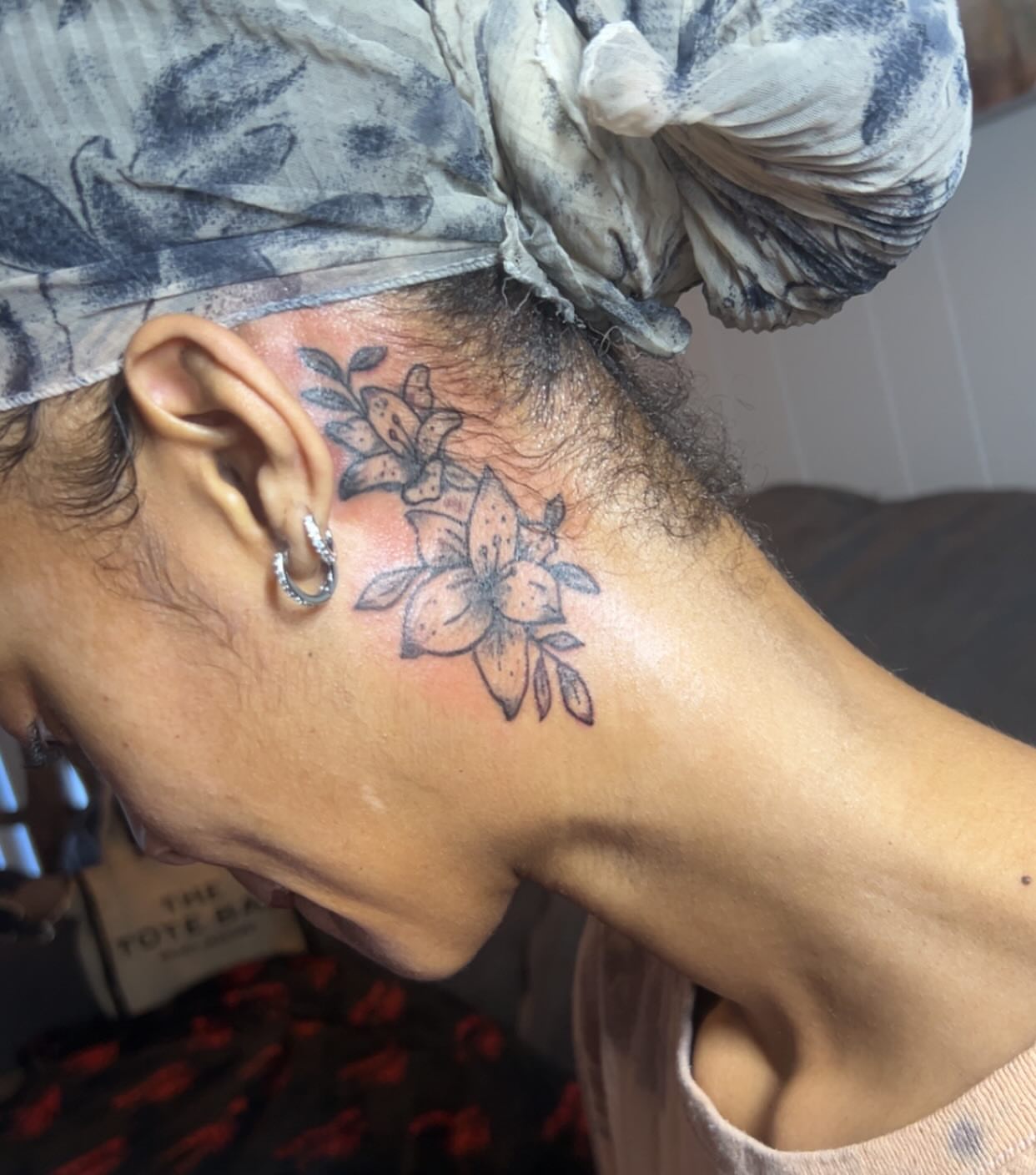 Flowers black and grey tattoo on the neck by Sarah Sharee💃🏽