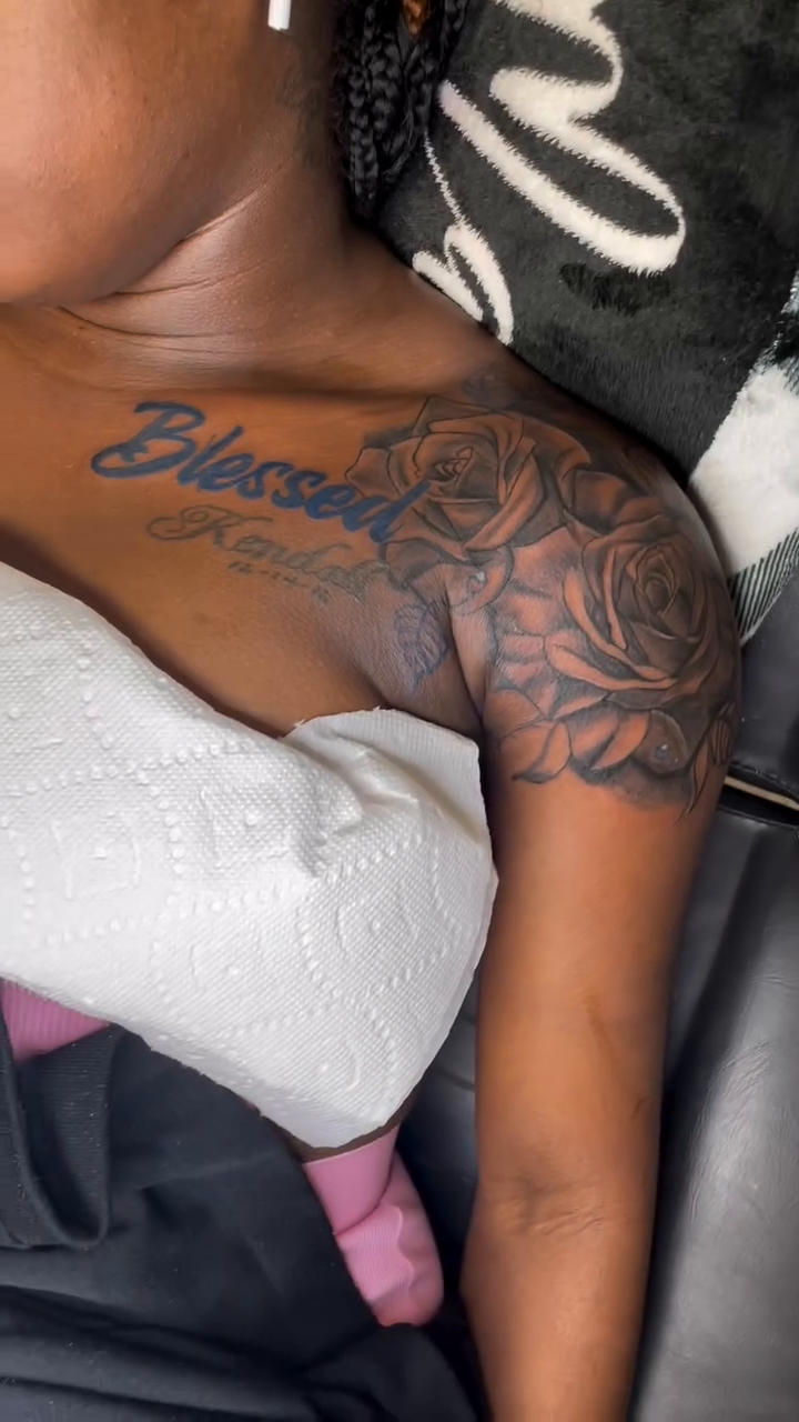 Blessed Kendall tattoo with roses lettering tattoo on the chest by Still Standing. Still Creating. 🖤